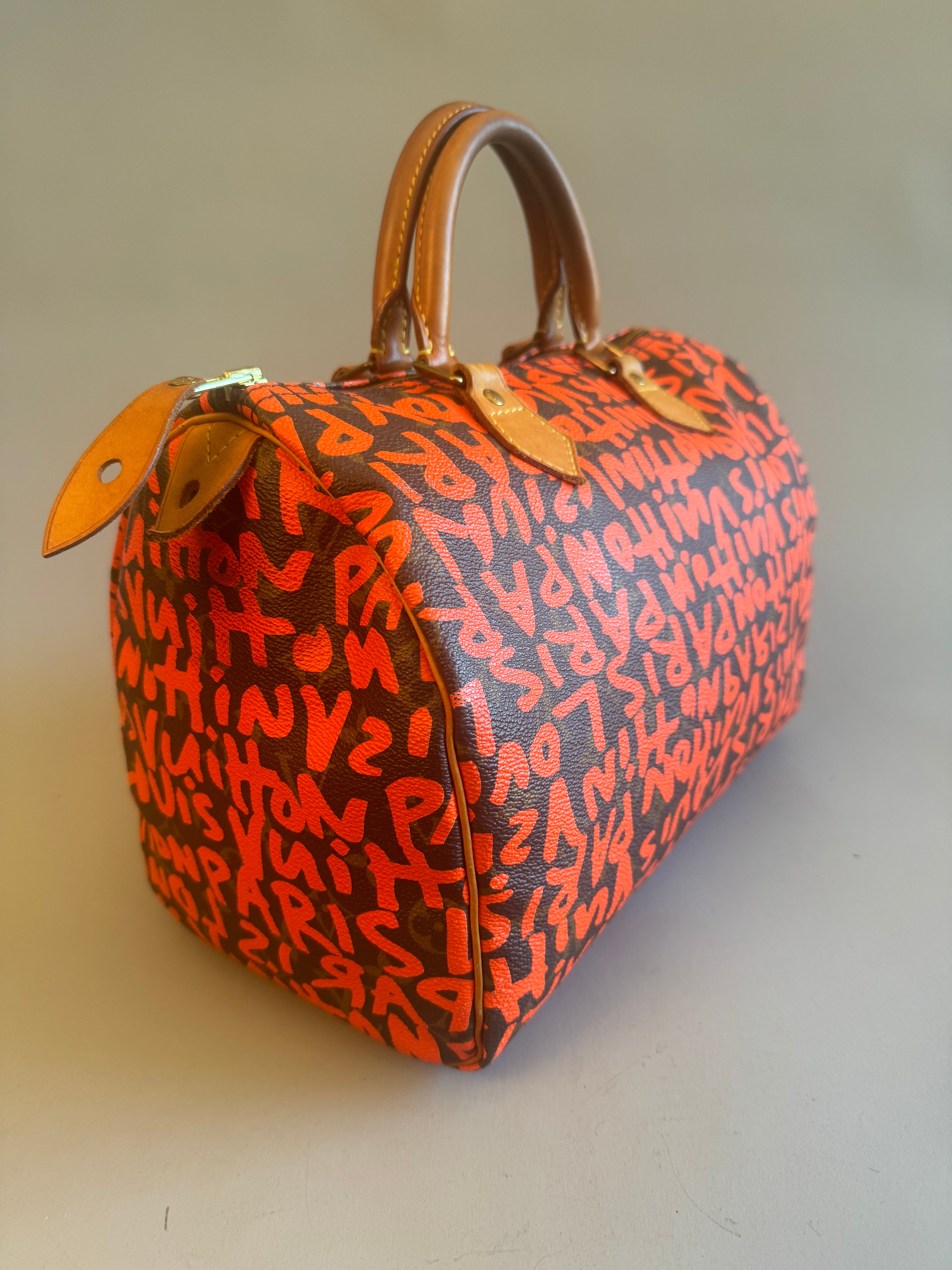 10067 Authentic Pre-loved Louis Vuitton Speedy 30 in Orange Graffiti Monogram canvas