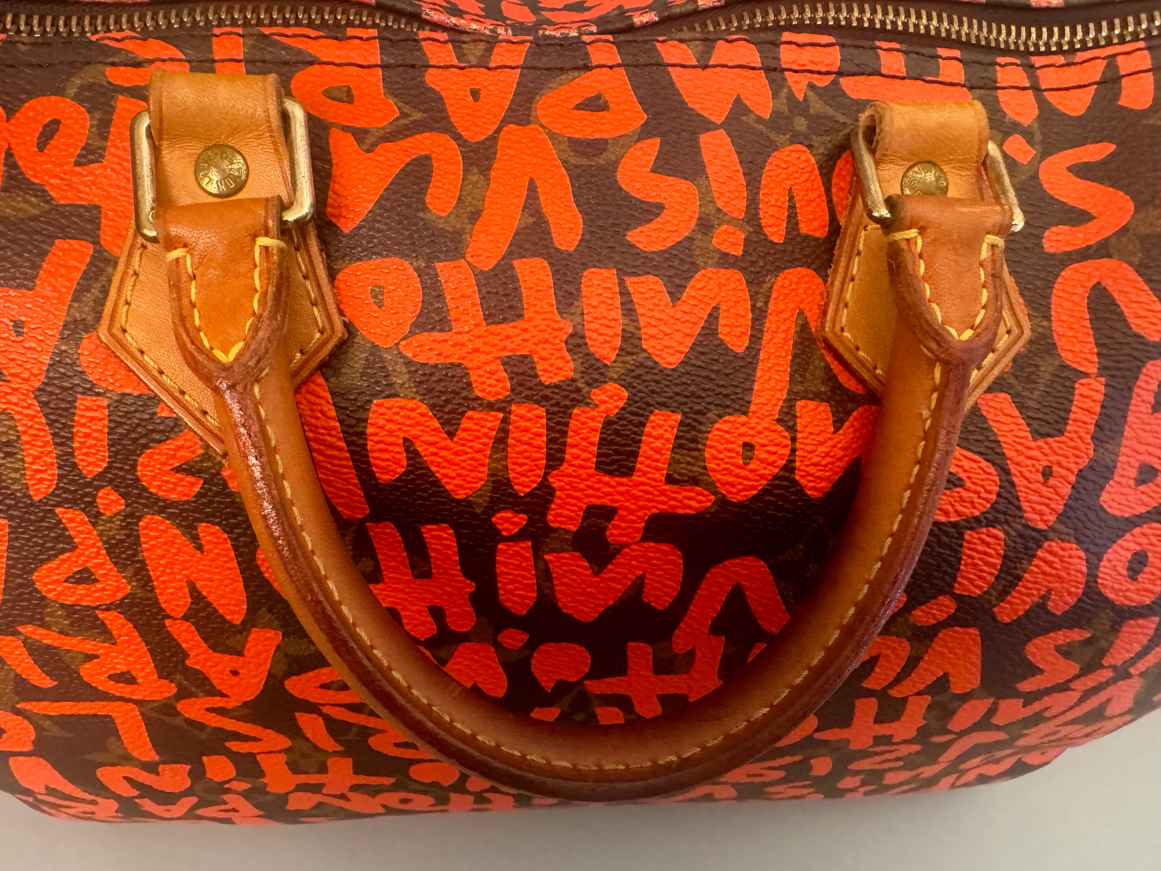 10067 Authentic Pre-loved Louis Vuitton Speedy 30 in Orange Graffiti Monogram canvas