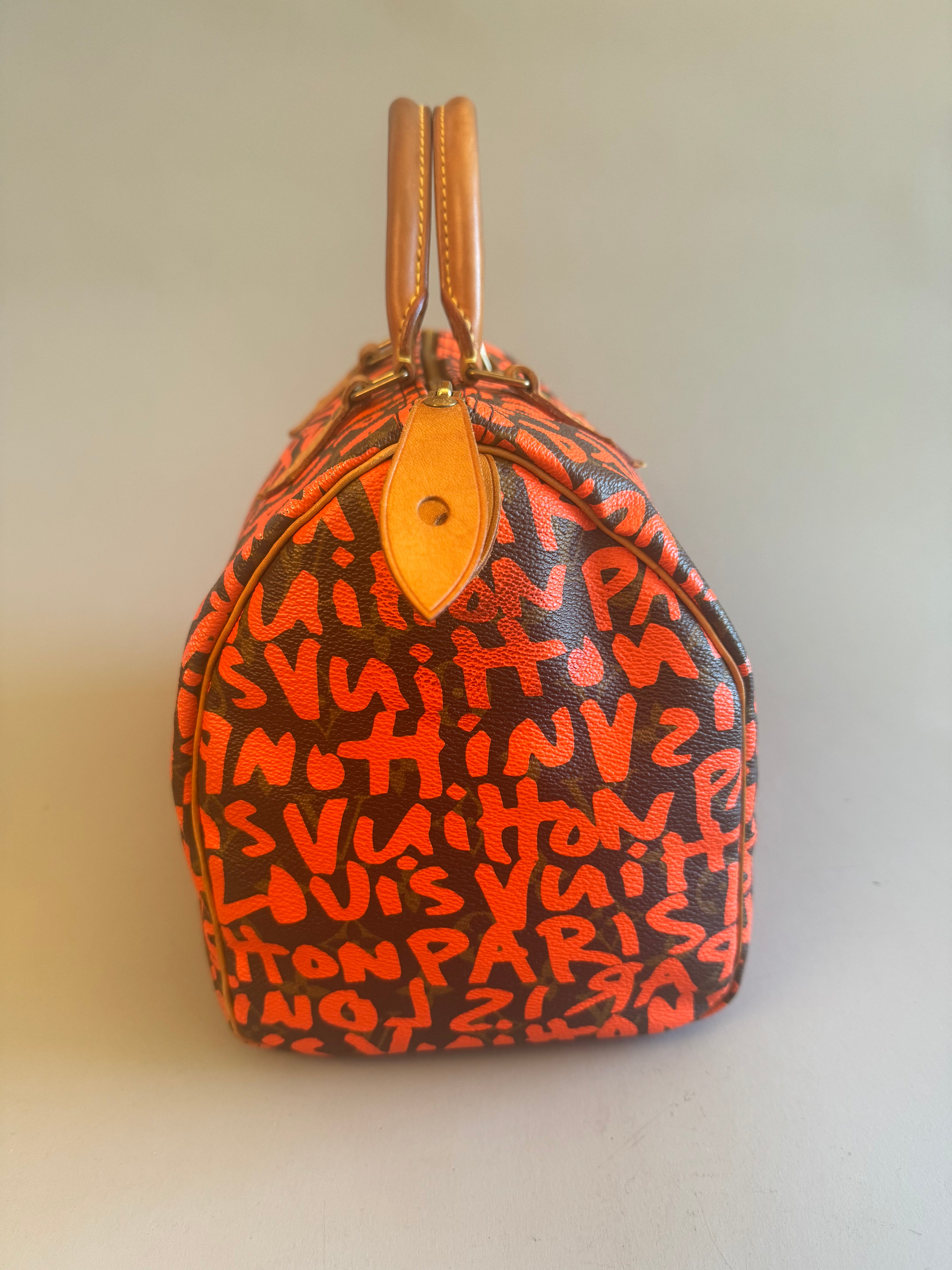 10067 Authentic Pre-loved Louis Vuitton Speedy 30 in Orange Graffiti Monogram canvas