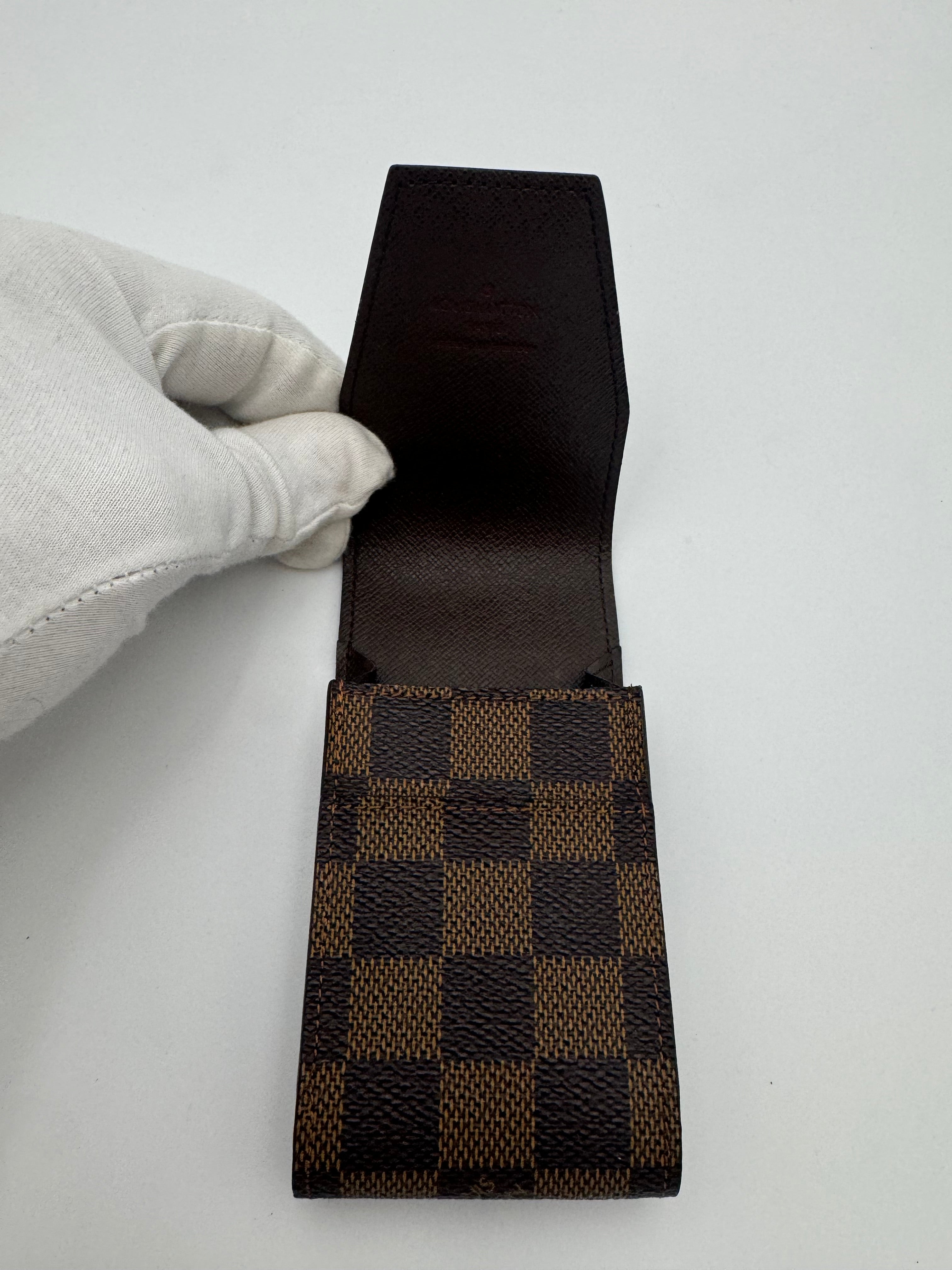 10297 Authentic Pre-loved Louis Vuitton
Cigaratte Holder
in Damier Ebene Canvas