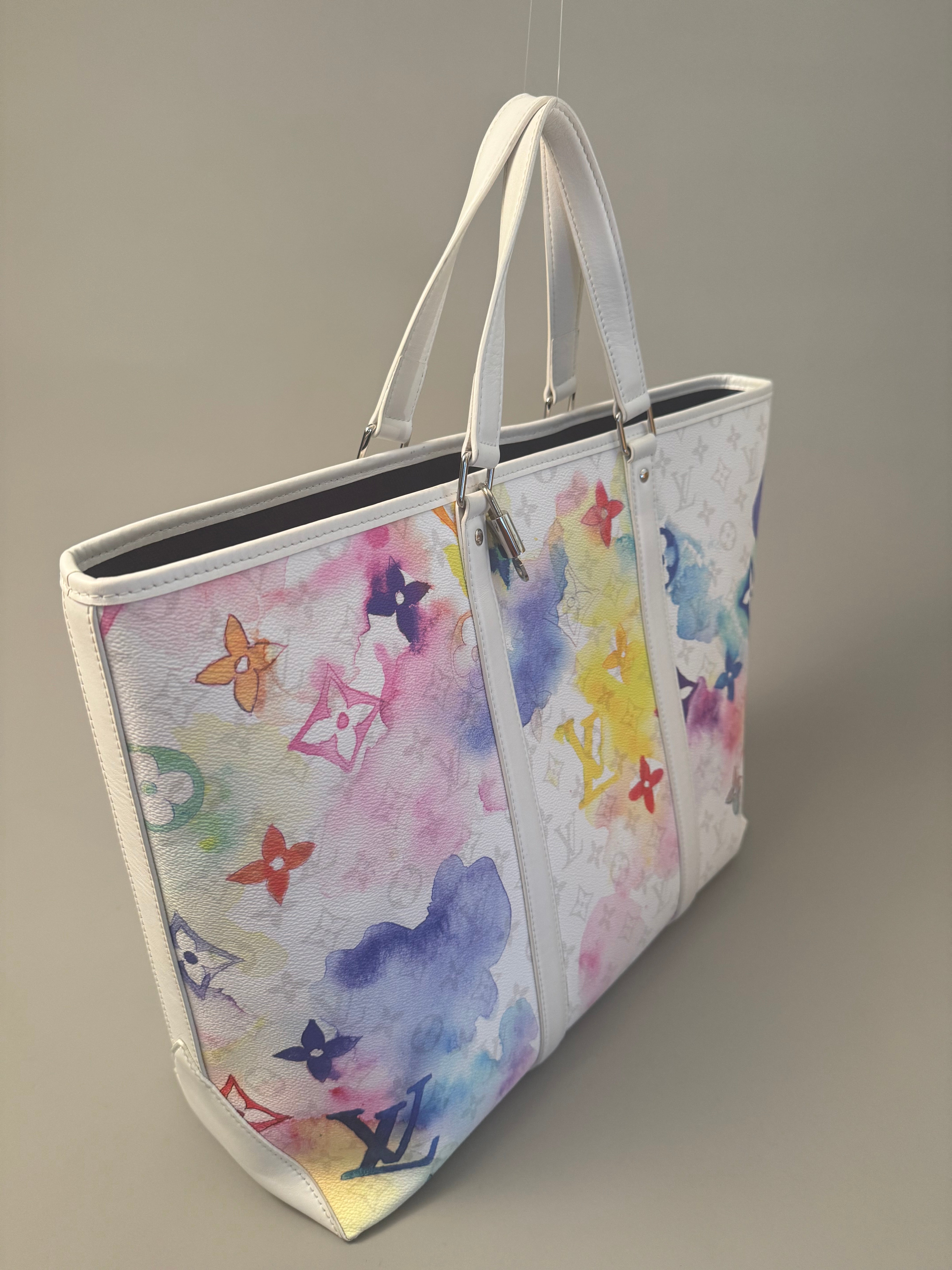 10294 Authentic Pre-loved Louis Vuitton
Weekend Tote GM
in Watercolor Canvas
Super Rare