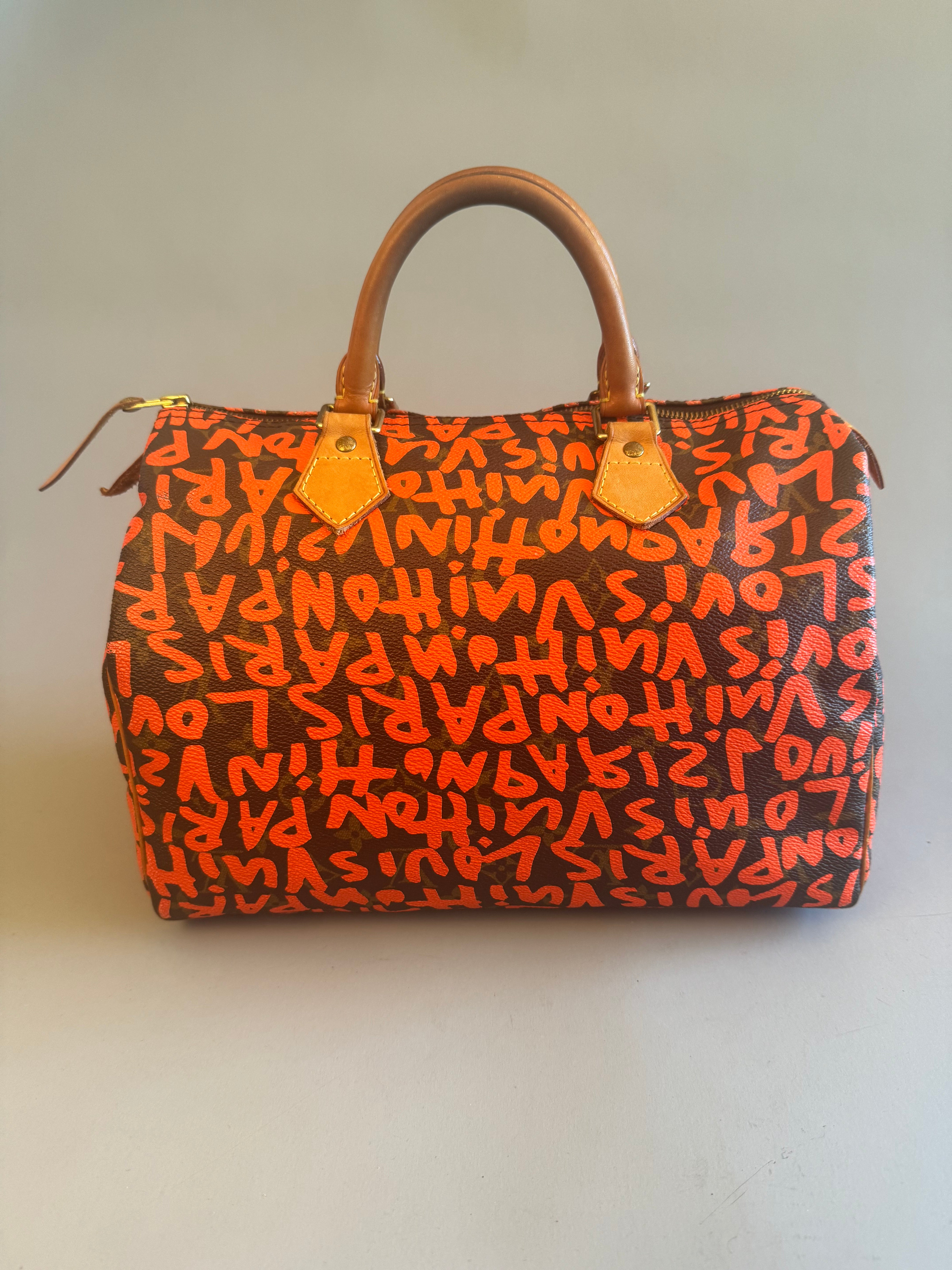 10067 Authentic Pre-loved Louis Vuitton Speedy 30 in Orange Graffiti Monogram canvas