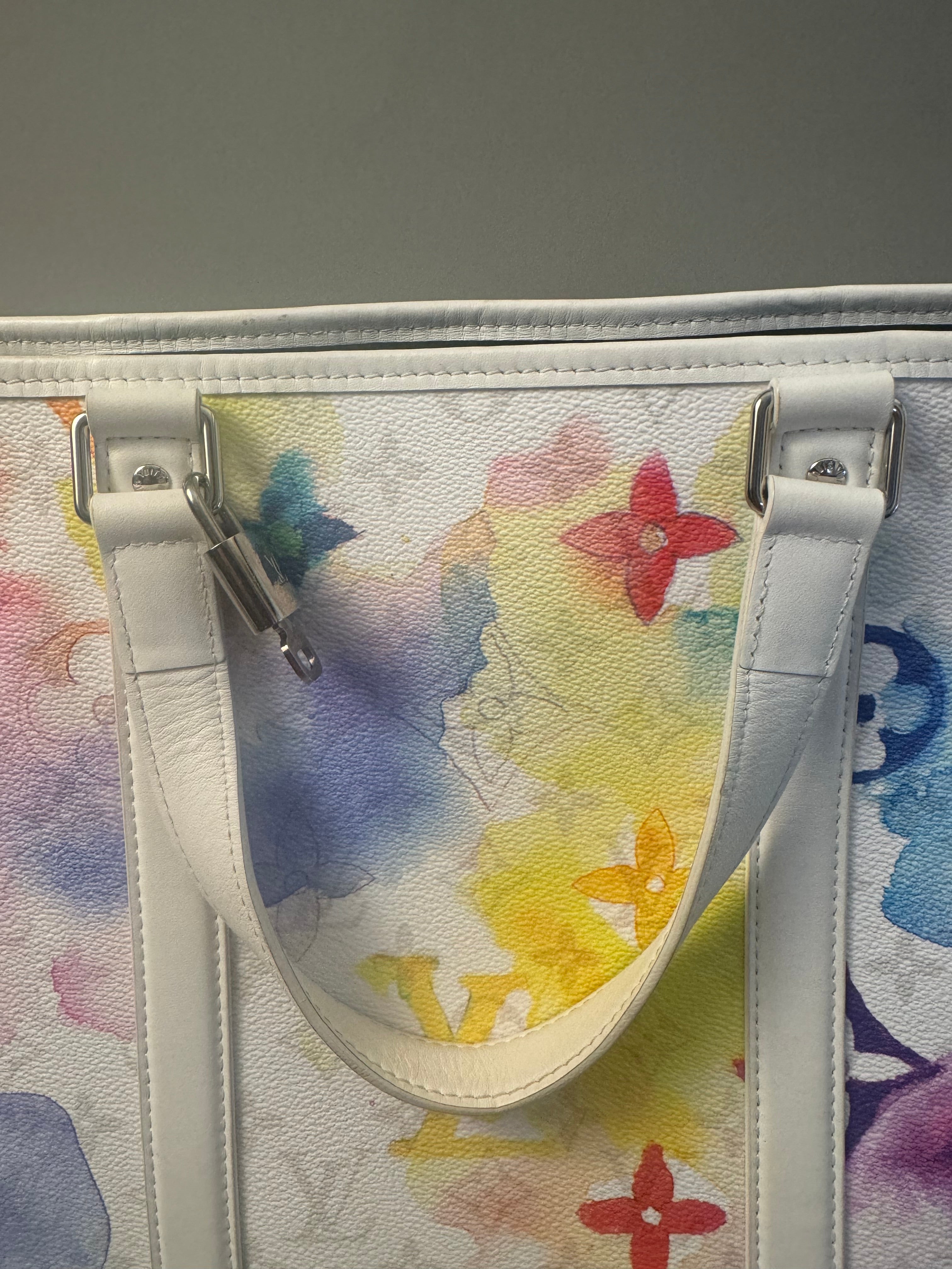 10294 Authentic Pre-loved Louis Vuitton
Weekend Tote GM
in Watercolor Canvas
Super Rare