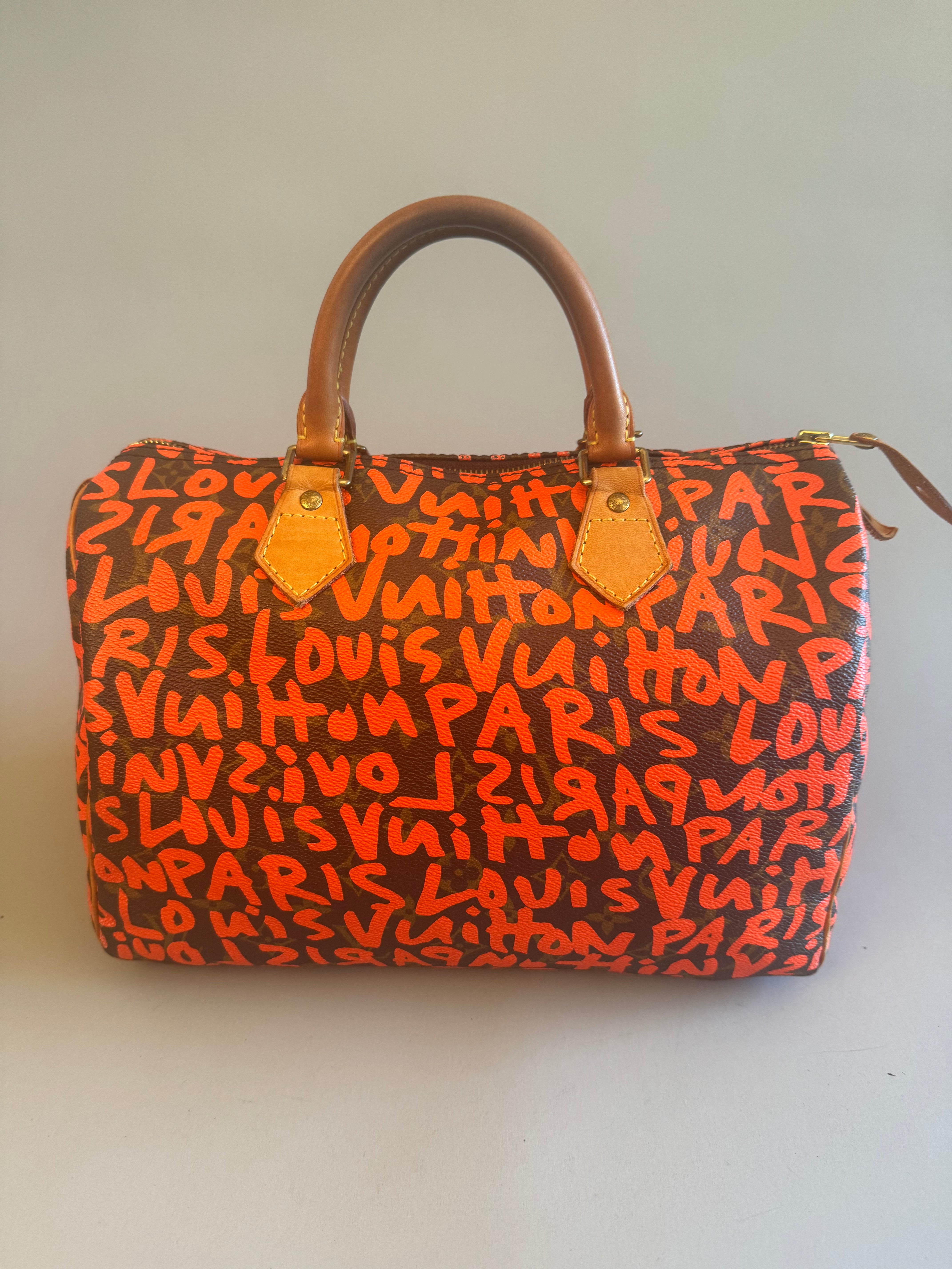 10067 Authentic Pre-loved Louis Vuitton Speedy 30 in Orange Graffiti Monogram canvas