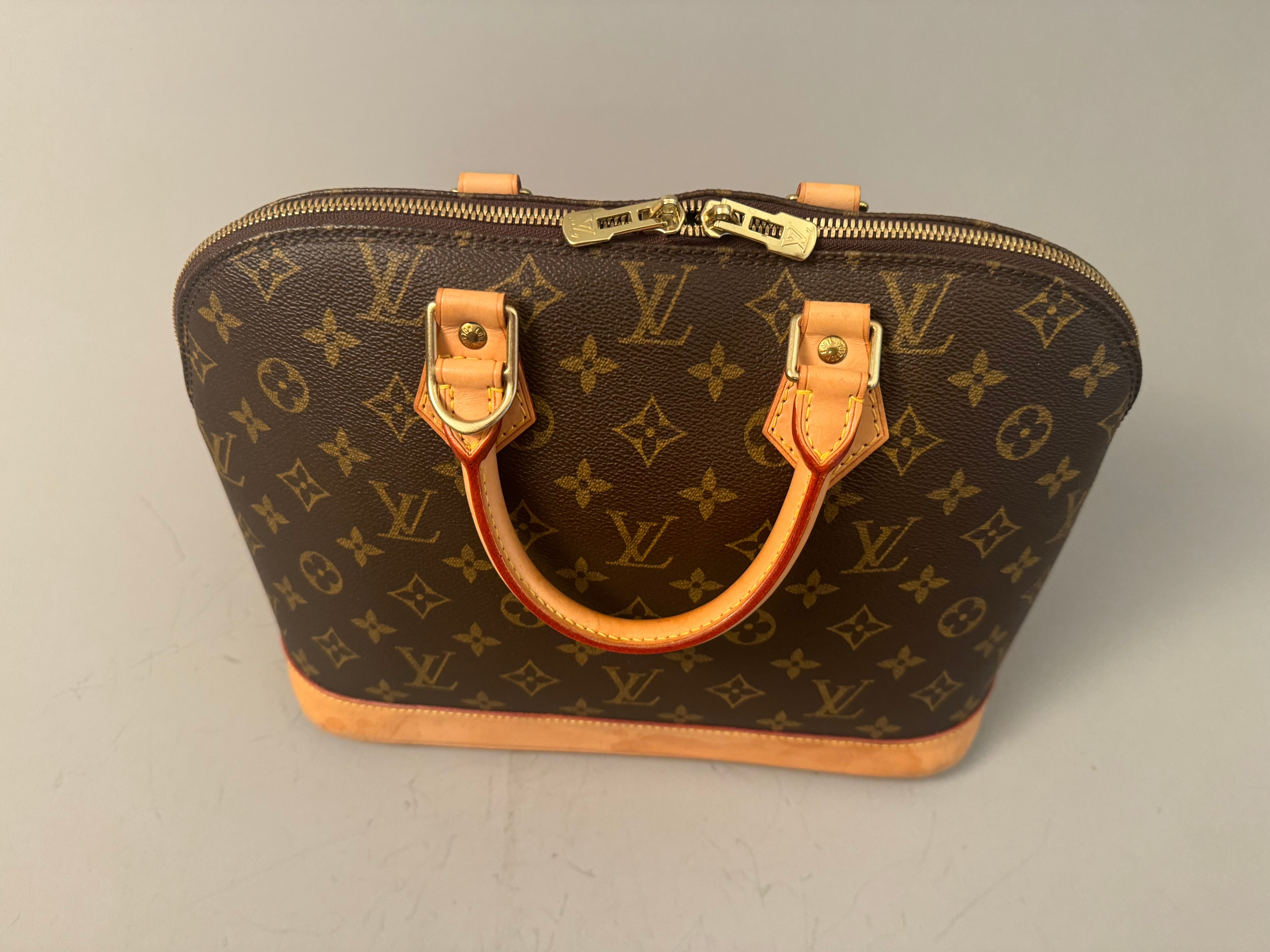 10235 Authentic Pre-Loved Louis Vuitton Alma in Monogram Canvas Fl0033