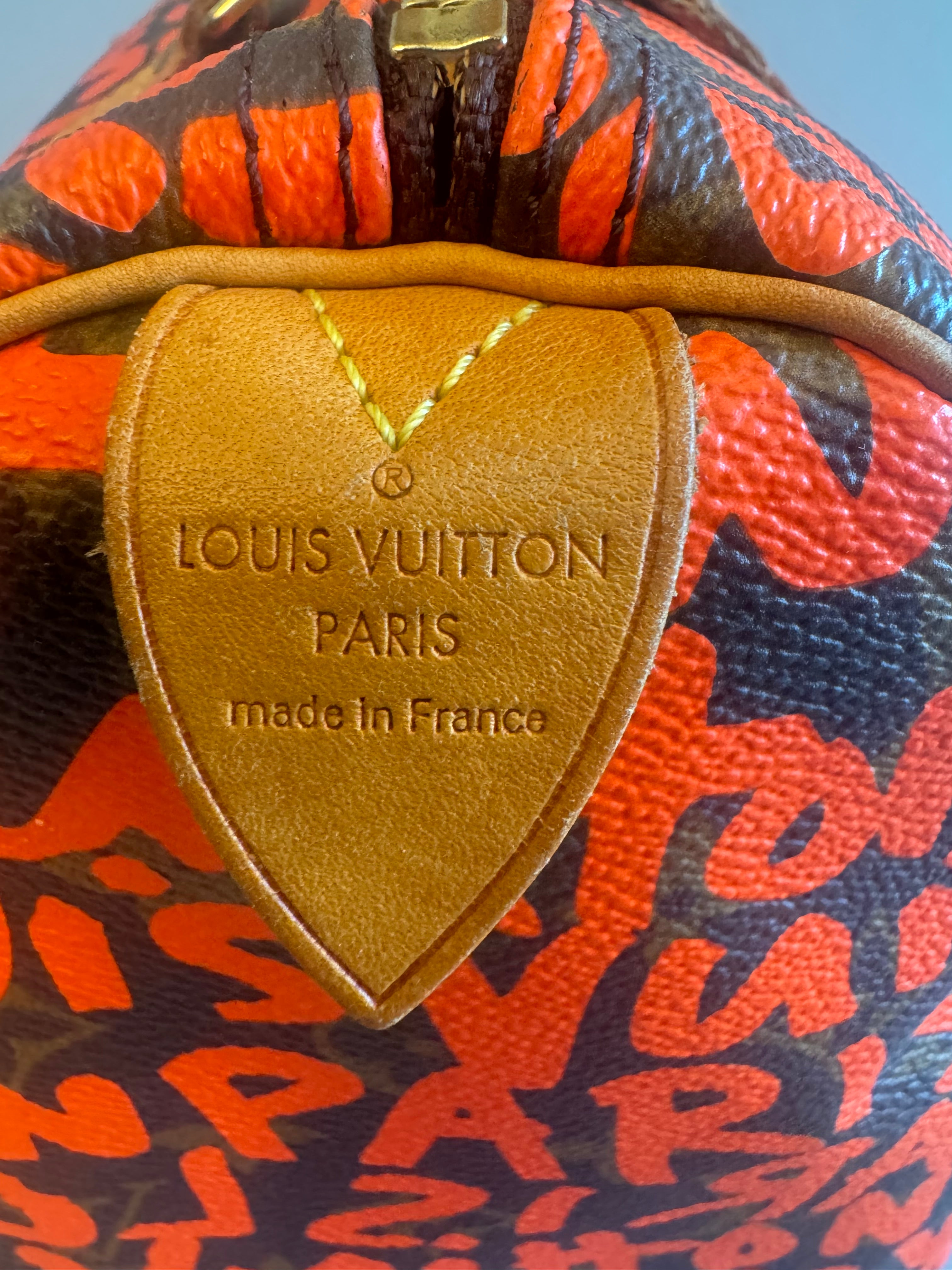 10067 Authentic Pre-loved Louis Vuitton Speedy 30 in Orange Graffiti Monogram canvas