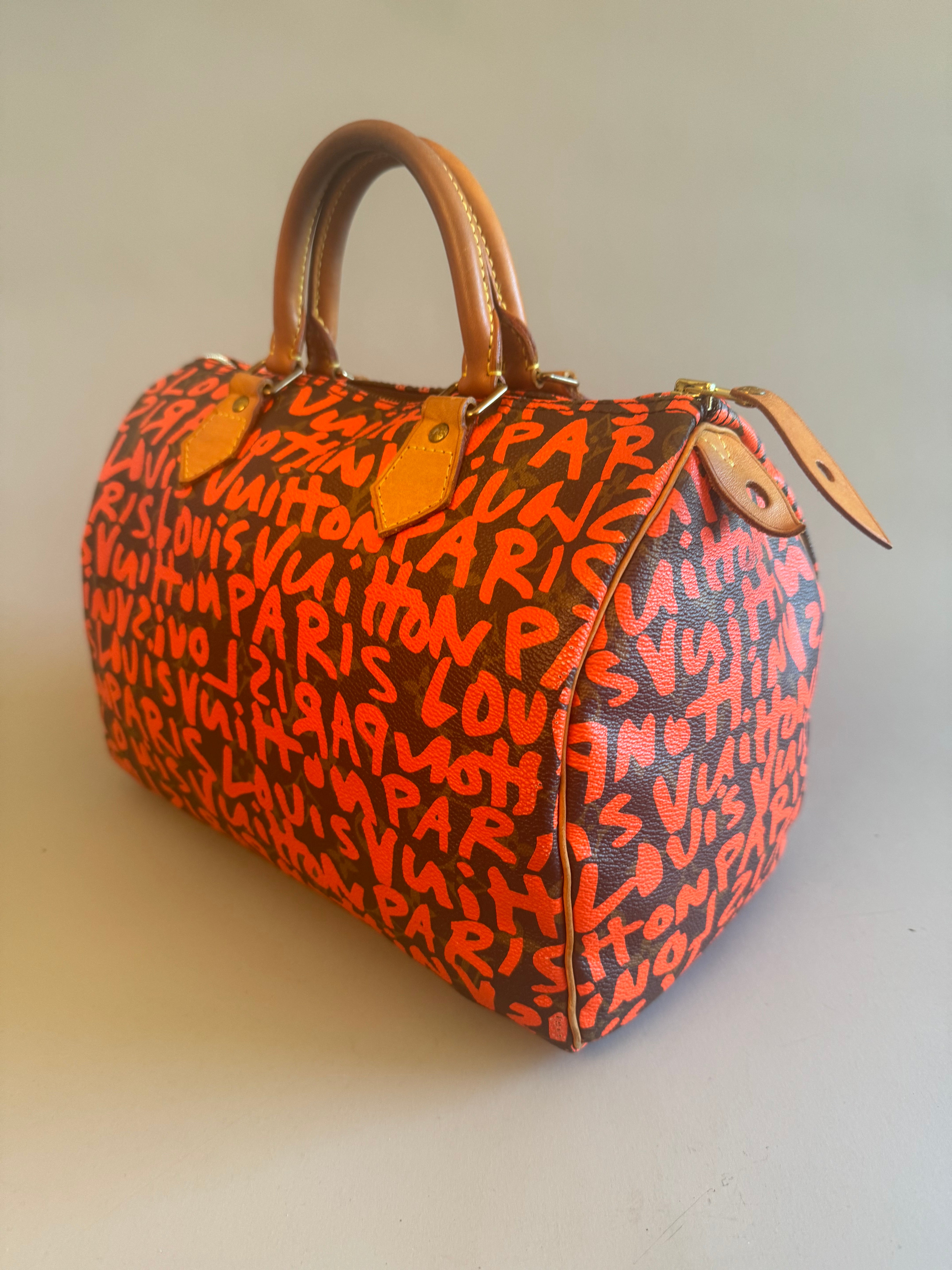 10067 Authentic Pre-loved Louis Vuitton Speedy 30 in Orange Graffiti Monogram canvas