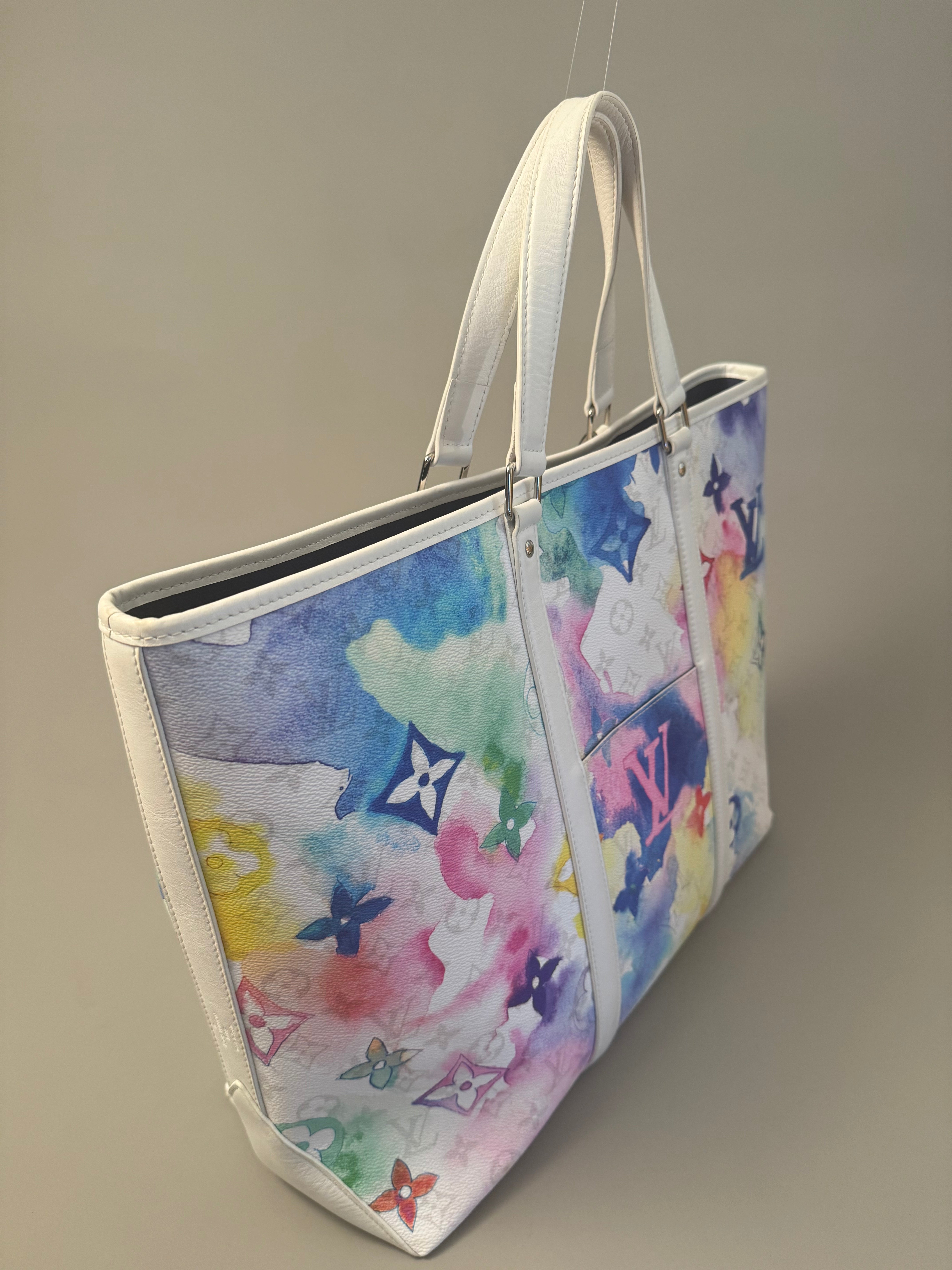 10294 Authentic Pre-loved Louis Vuitton
Weekend Tote GM
in Watercolor Canvas
Super Rare