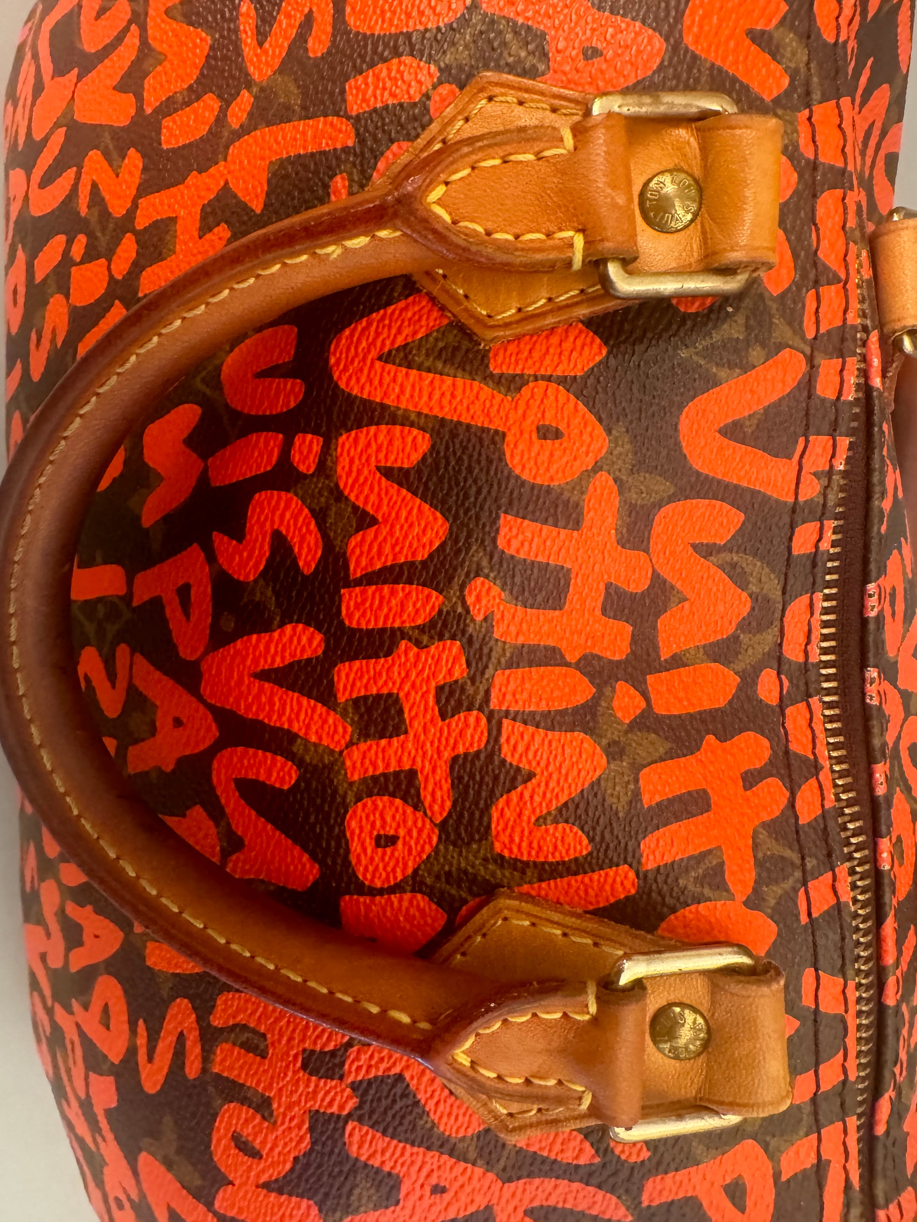 10067 Authentic Pre-loved Louis Vuitton Speedy 30 in Orange Graffiti Monogram canvas