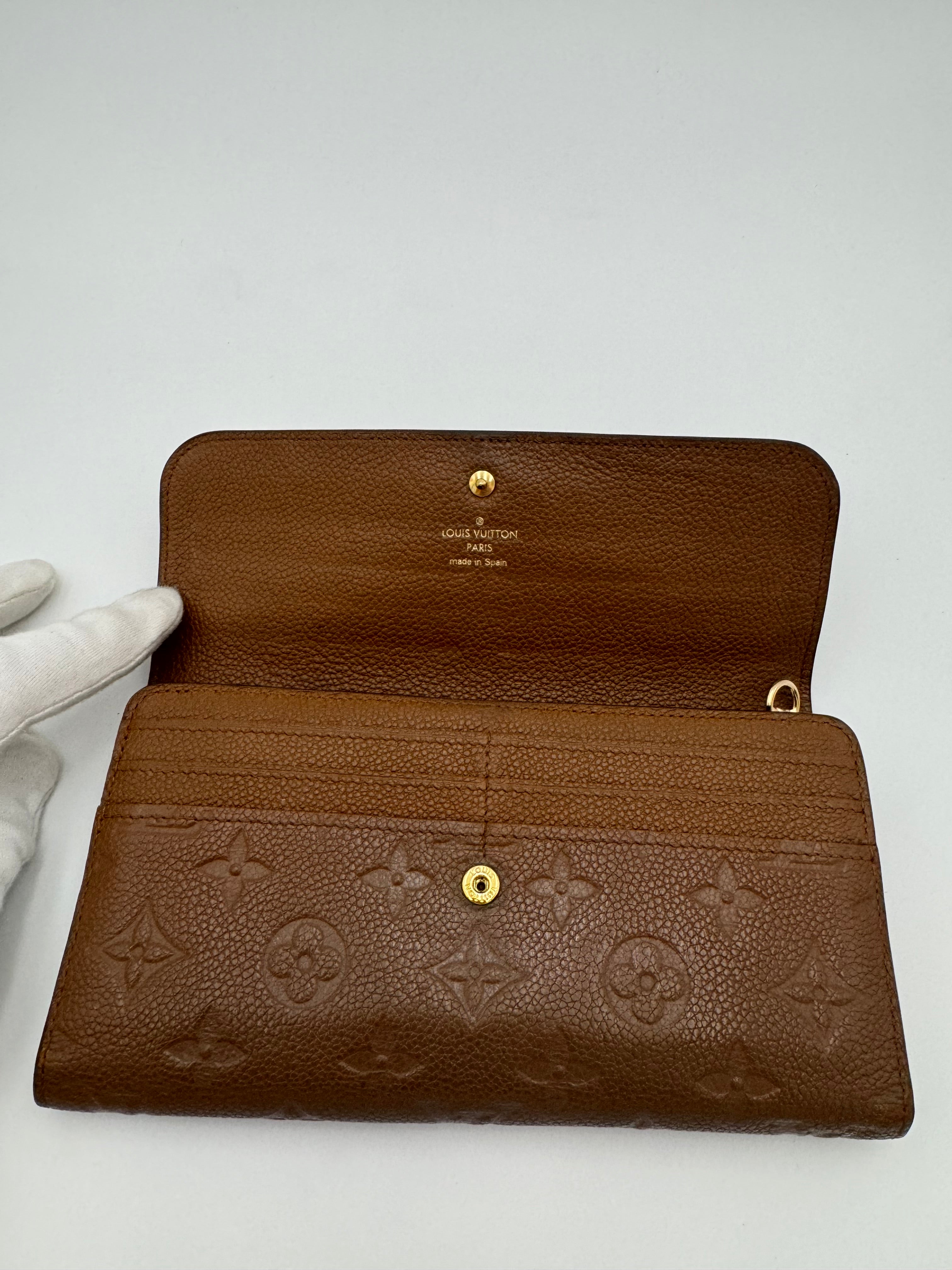 10304 Authentic Pre-loved Louis Vuitton
Trifold Wallet
in Brown Empriente Leather