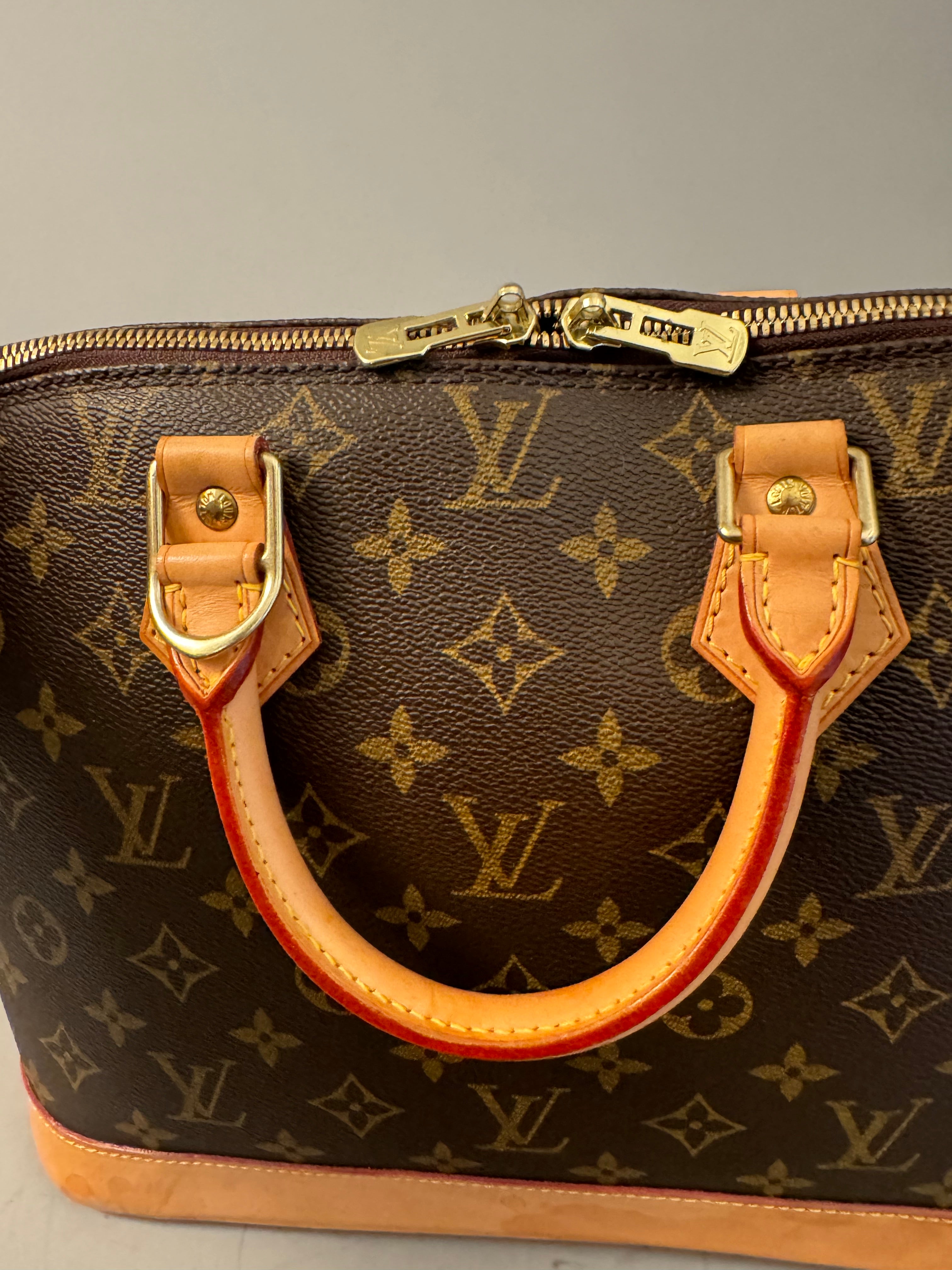 10235 Authentic Pre-Loved Louis Vuitton Alma in Monogram Canvas Fl0033