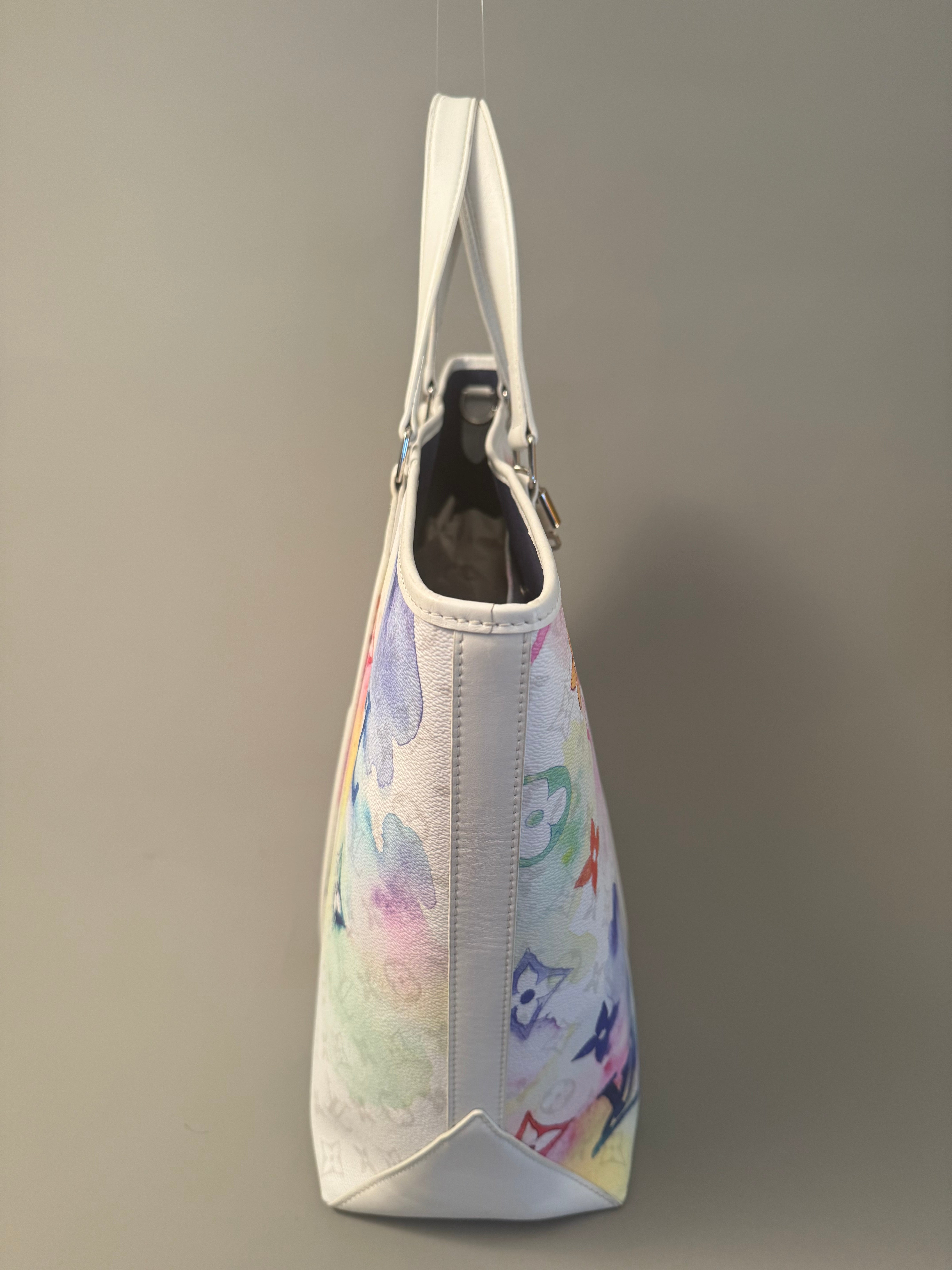 10294 Authentic Pre-loved Louis Vuitton
Weekend Tote GM
in Watercolor Canvas
Super Rare