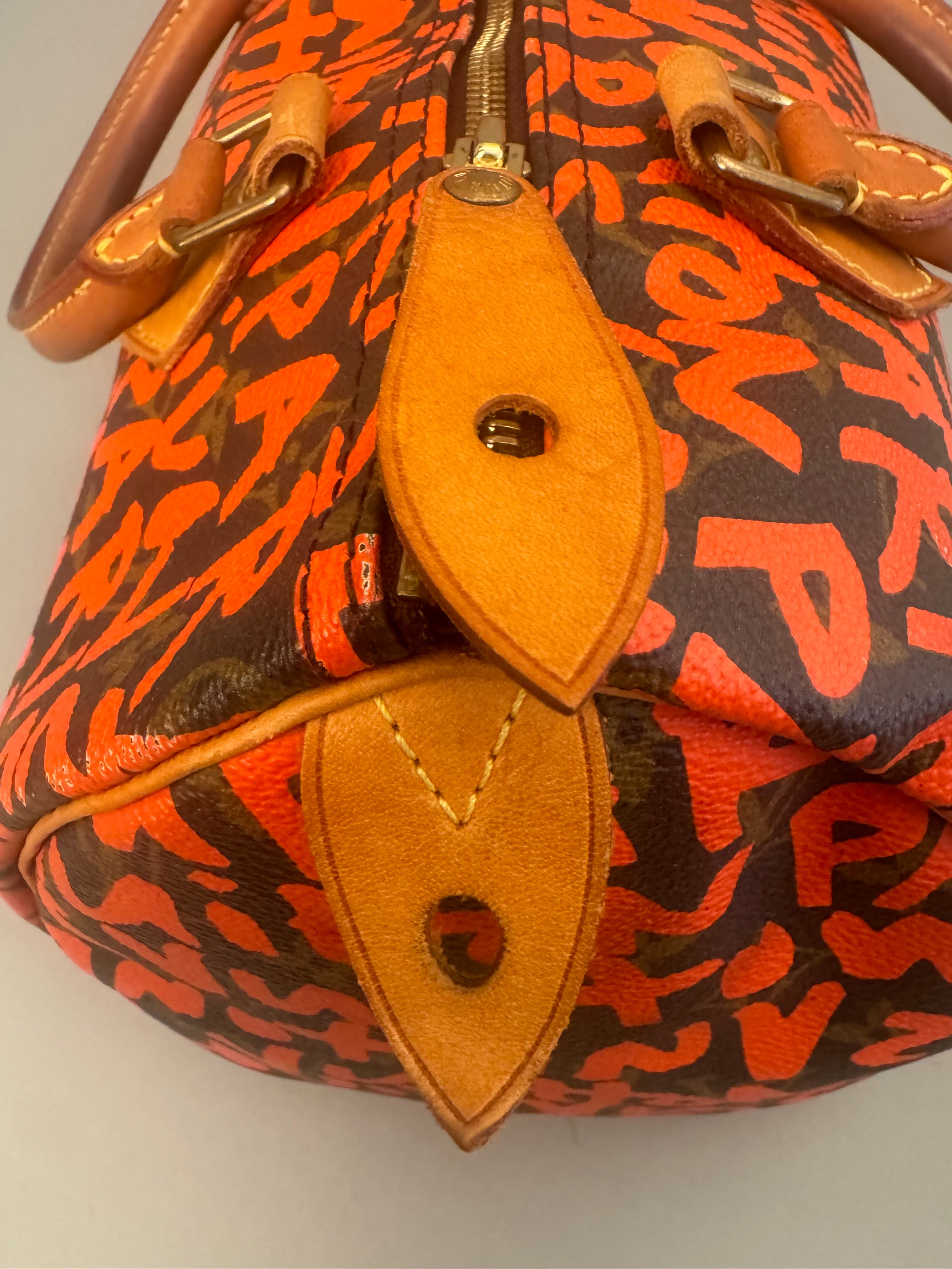 10067 Authentic Pre-loved Louis Vuitton Speedy 30 in Orange Graffiti Monogram canvas