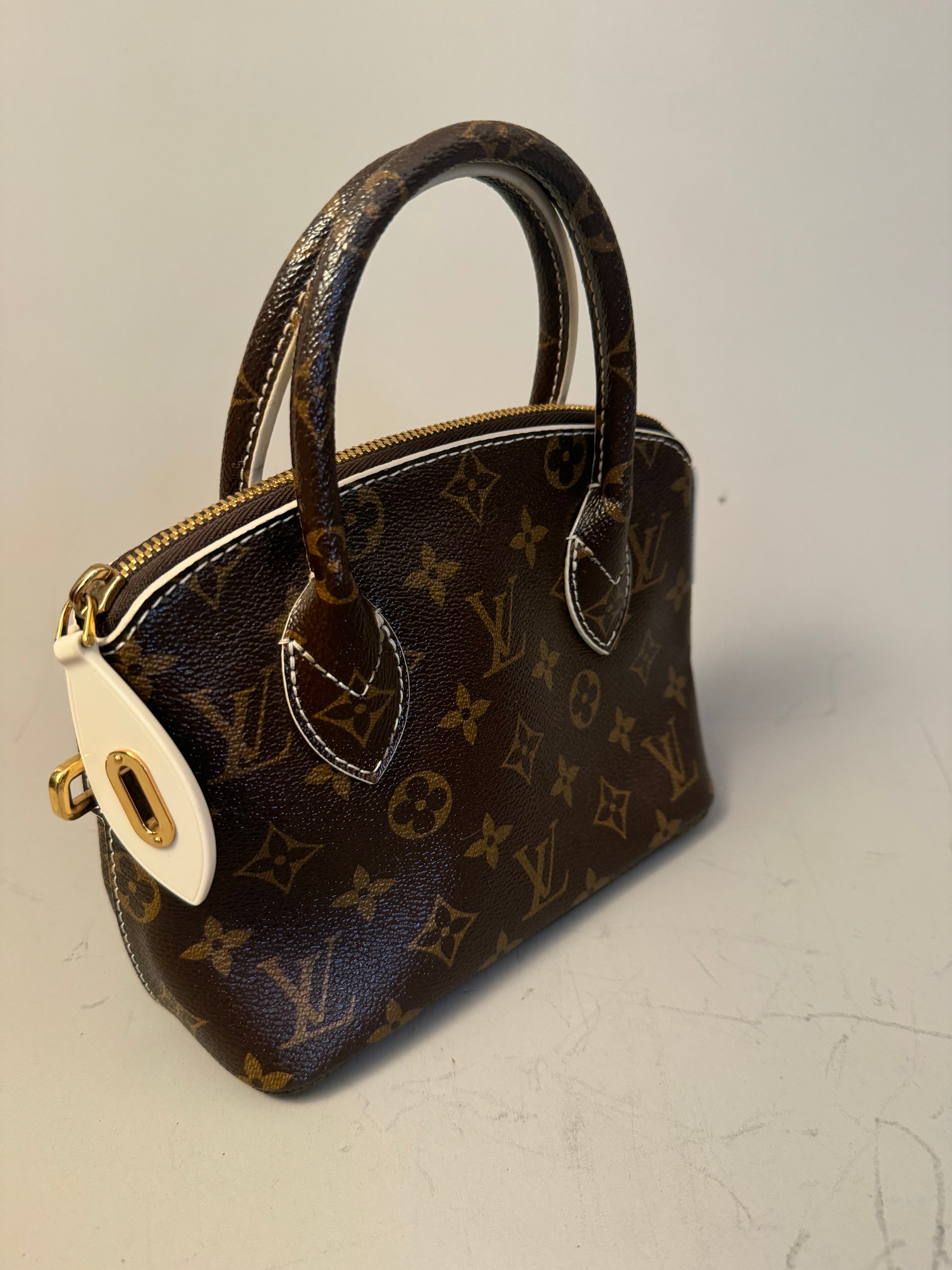 10243 Authentic Pre-loved Louis Vuitton Lock It BB in Monogram Canvas