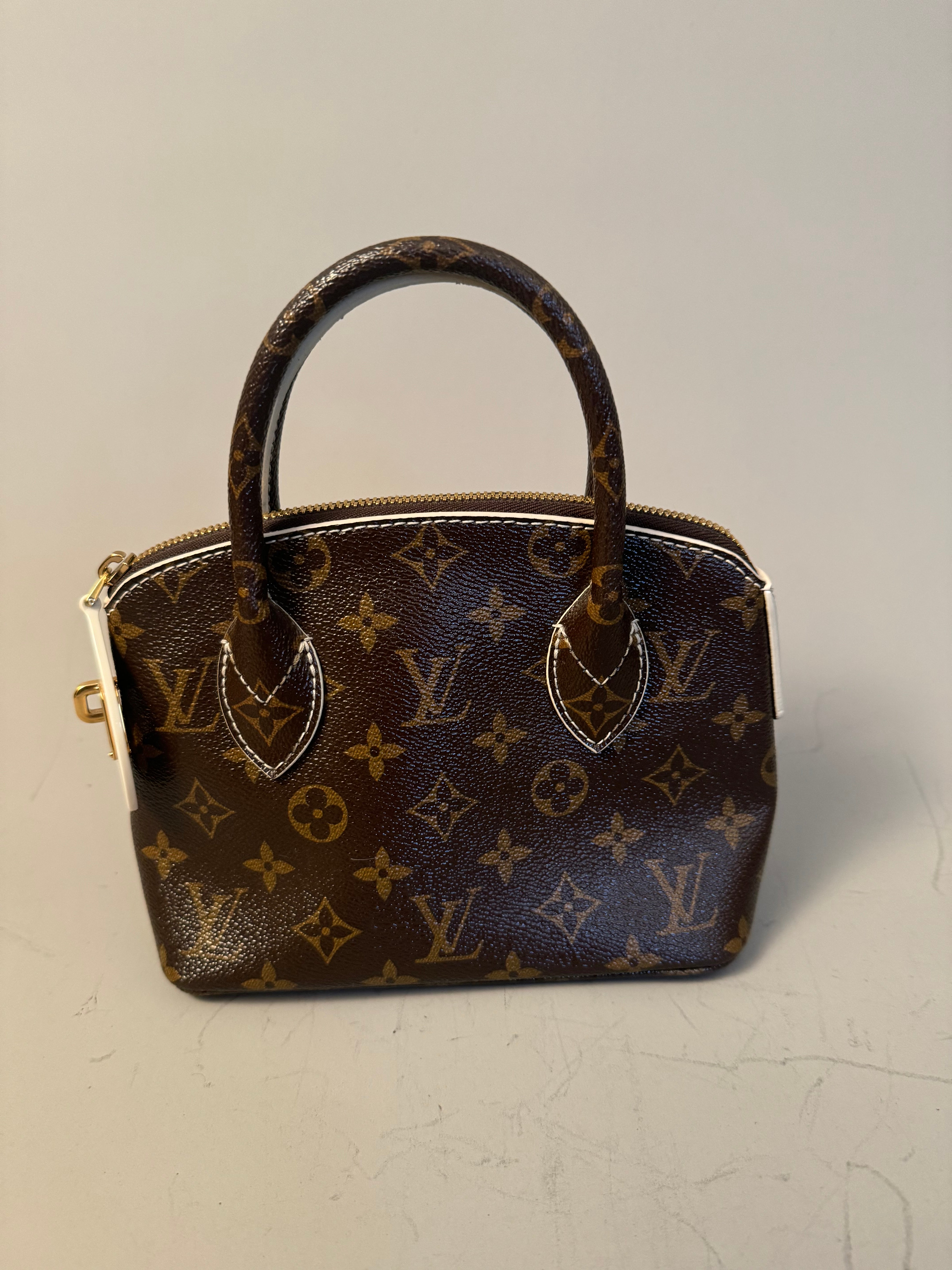 10243 Authentic Pre-loved Louis Vuitton Lock It BB in Monogram Canvas