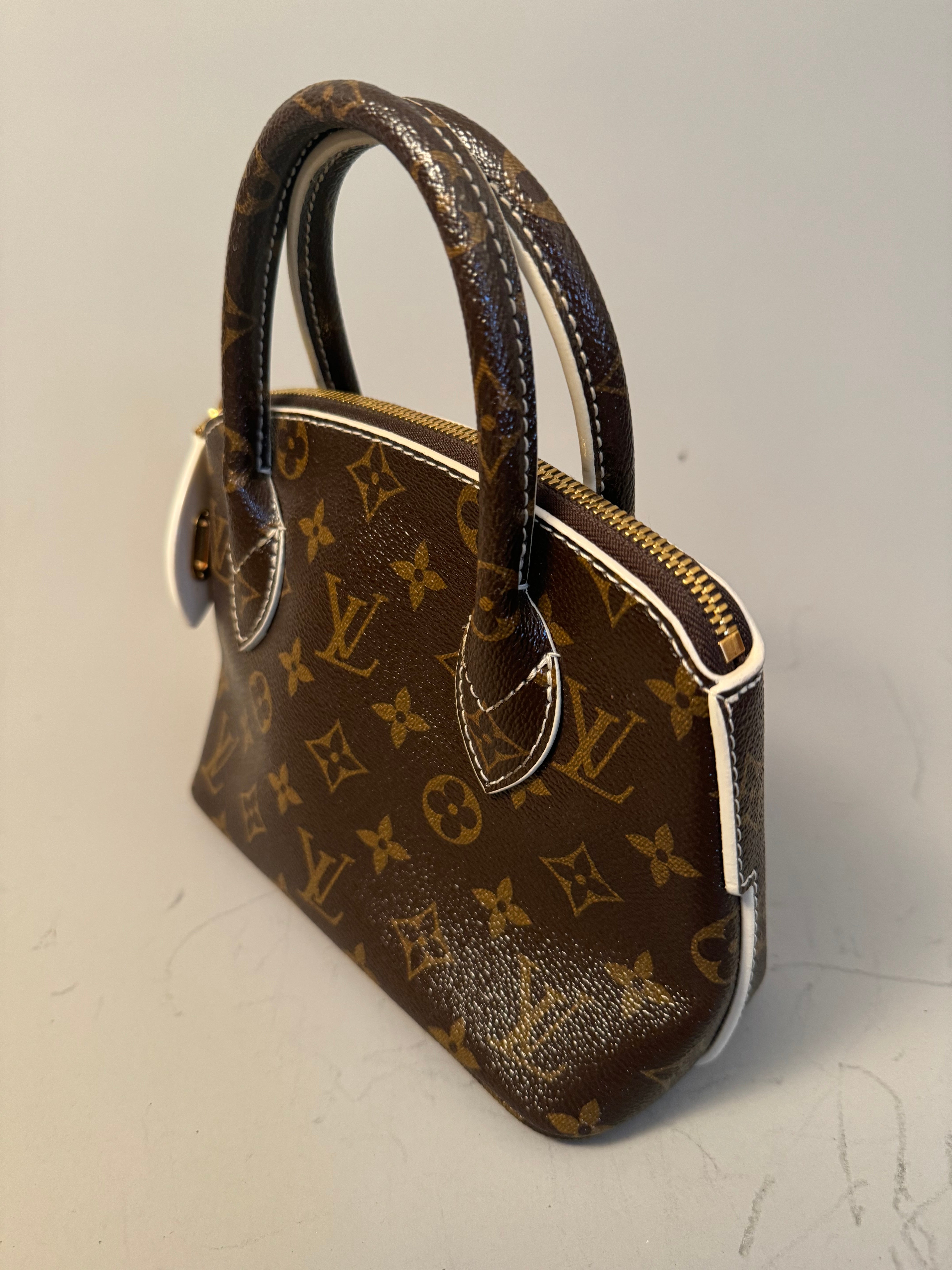 10243 Authentic Pre-loved Louis Vuitton Lock It BB in Monogram Canvas