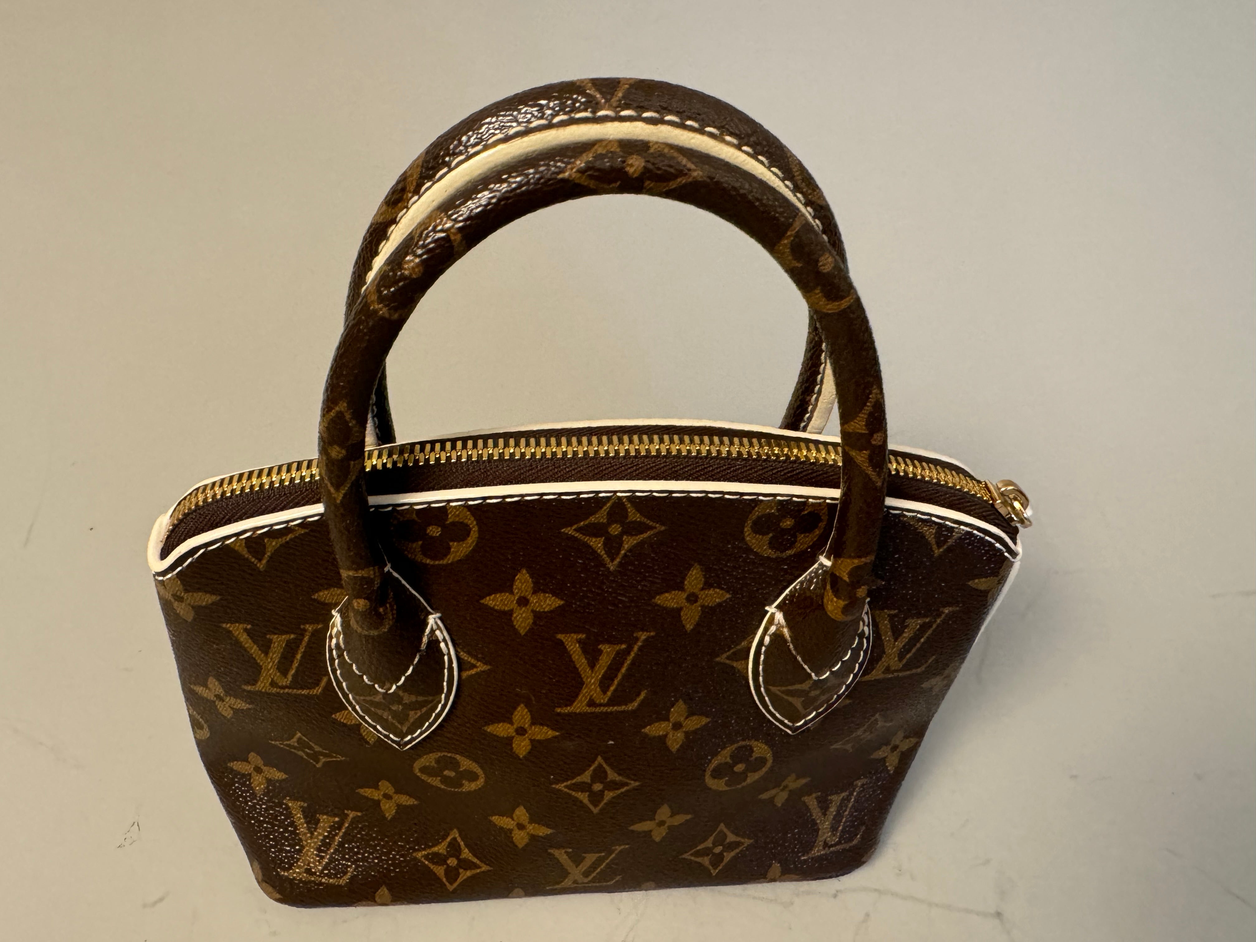 10243 Authentic Pre-loved Louis Vuitton Lock It BB in Monogram Canvas