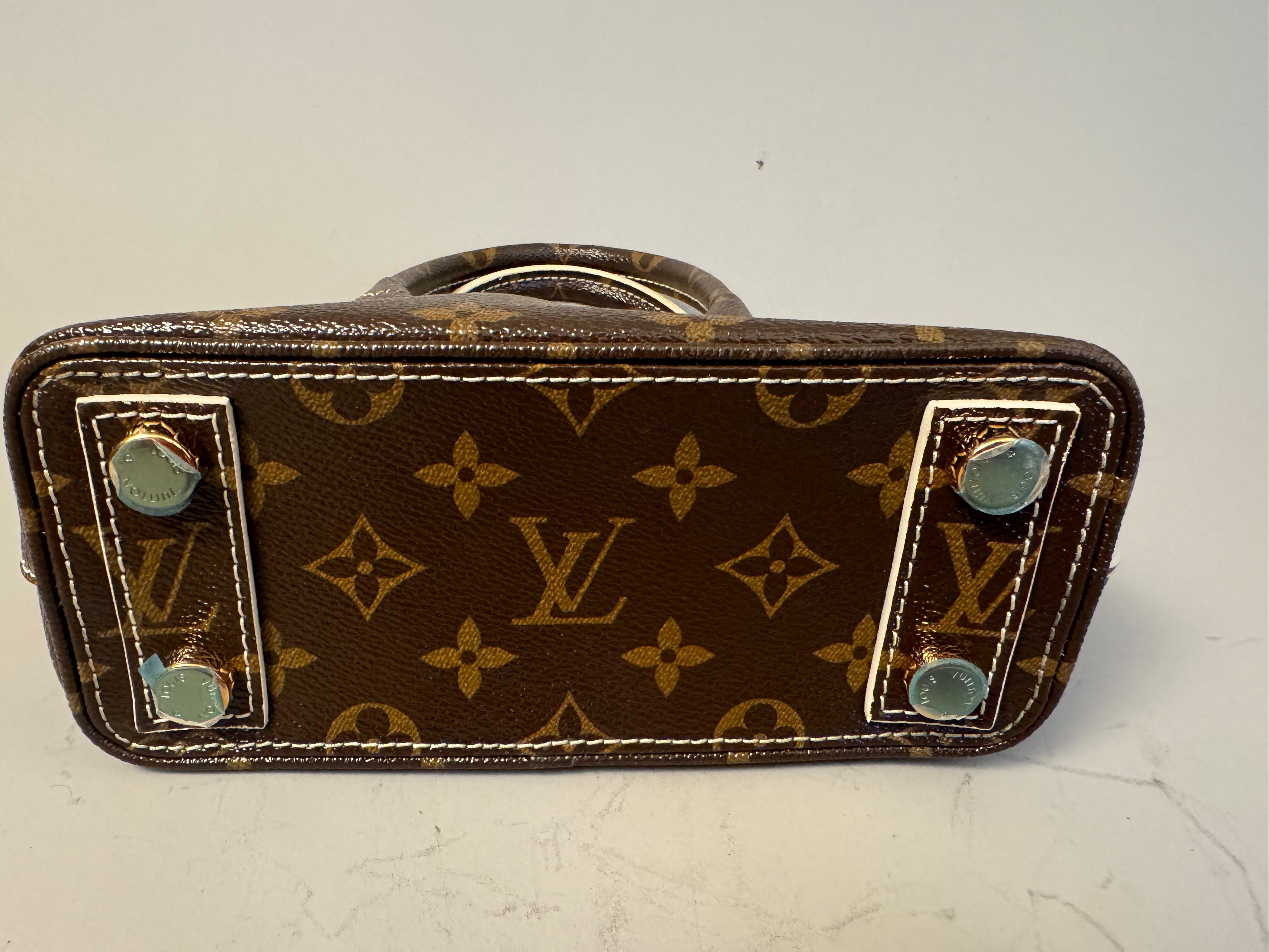 10243 Authentic Pre-loved Louis Vuitton Lock It BB in Monogram Canvas