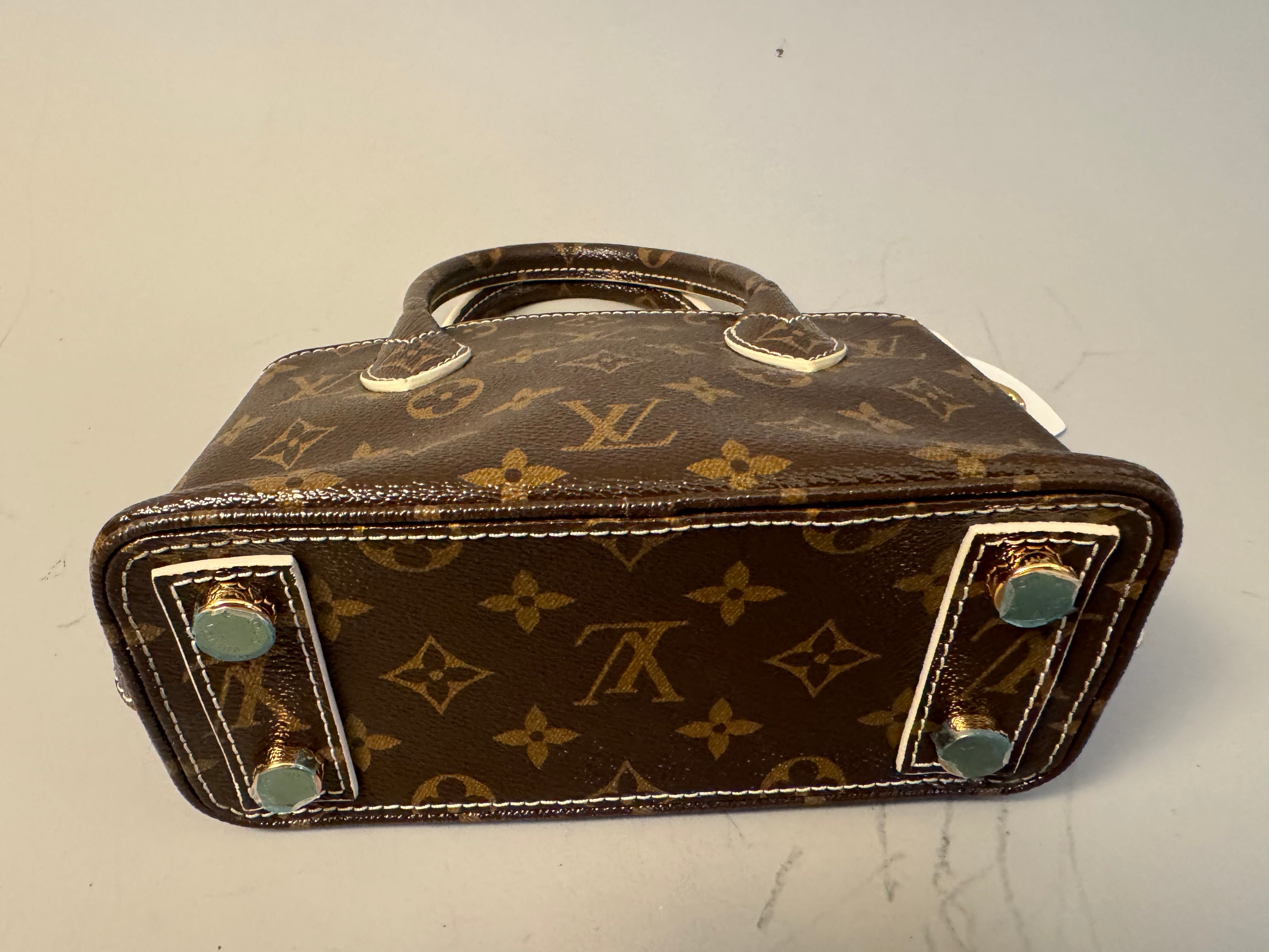 10243 Authentic Pre-loved Louis Vuitton Lock It BB in Monogram Canvas