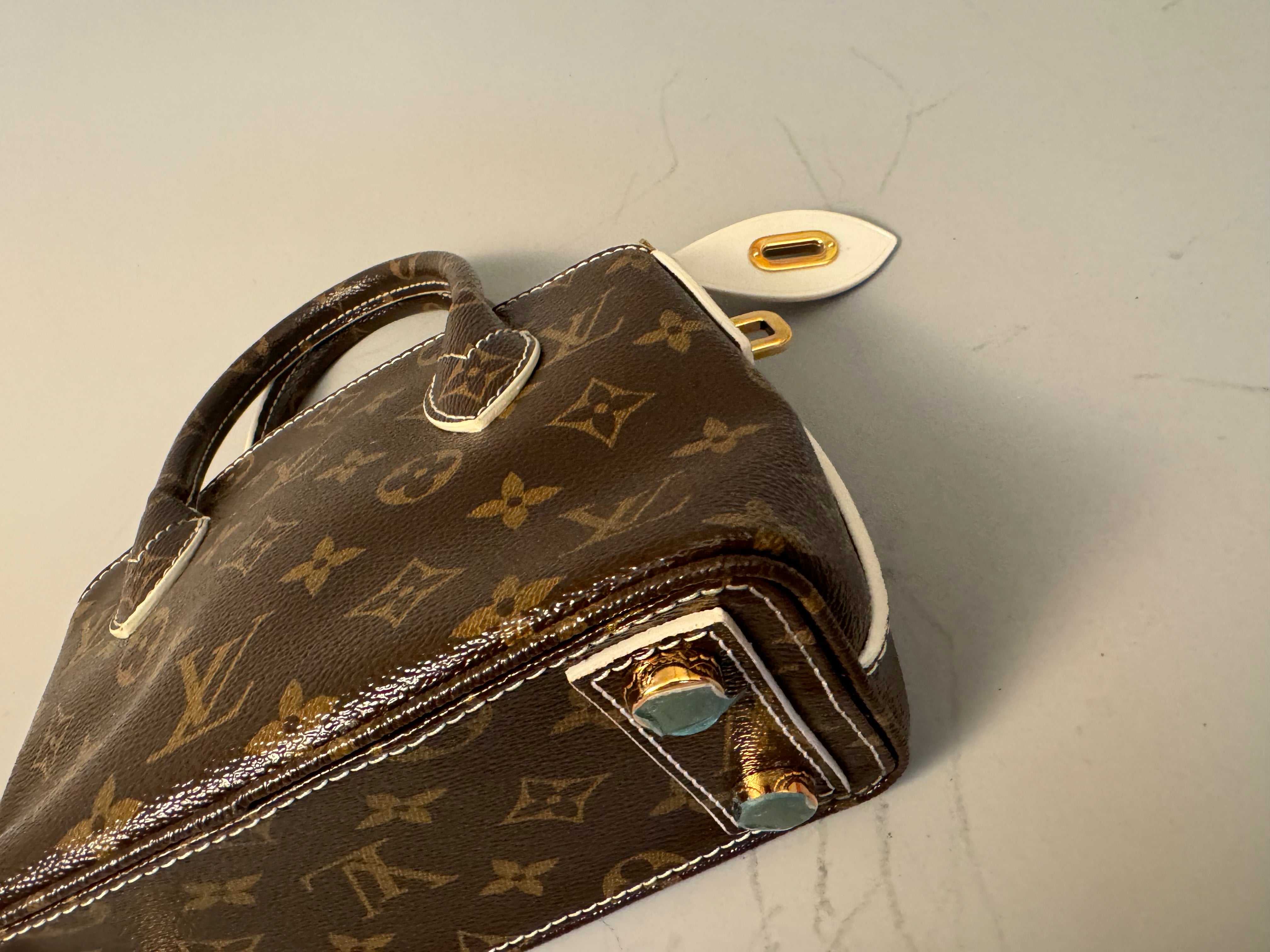 10243 Authentic Pre-loved Louis Vuitton Lock It BB in Monogram Canvas