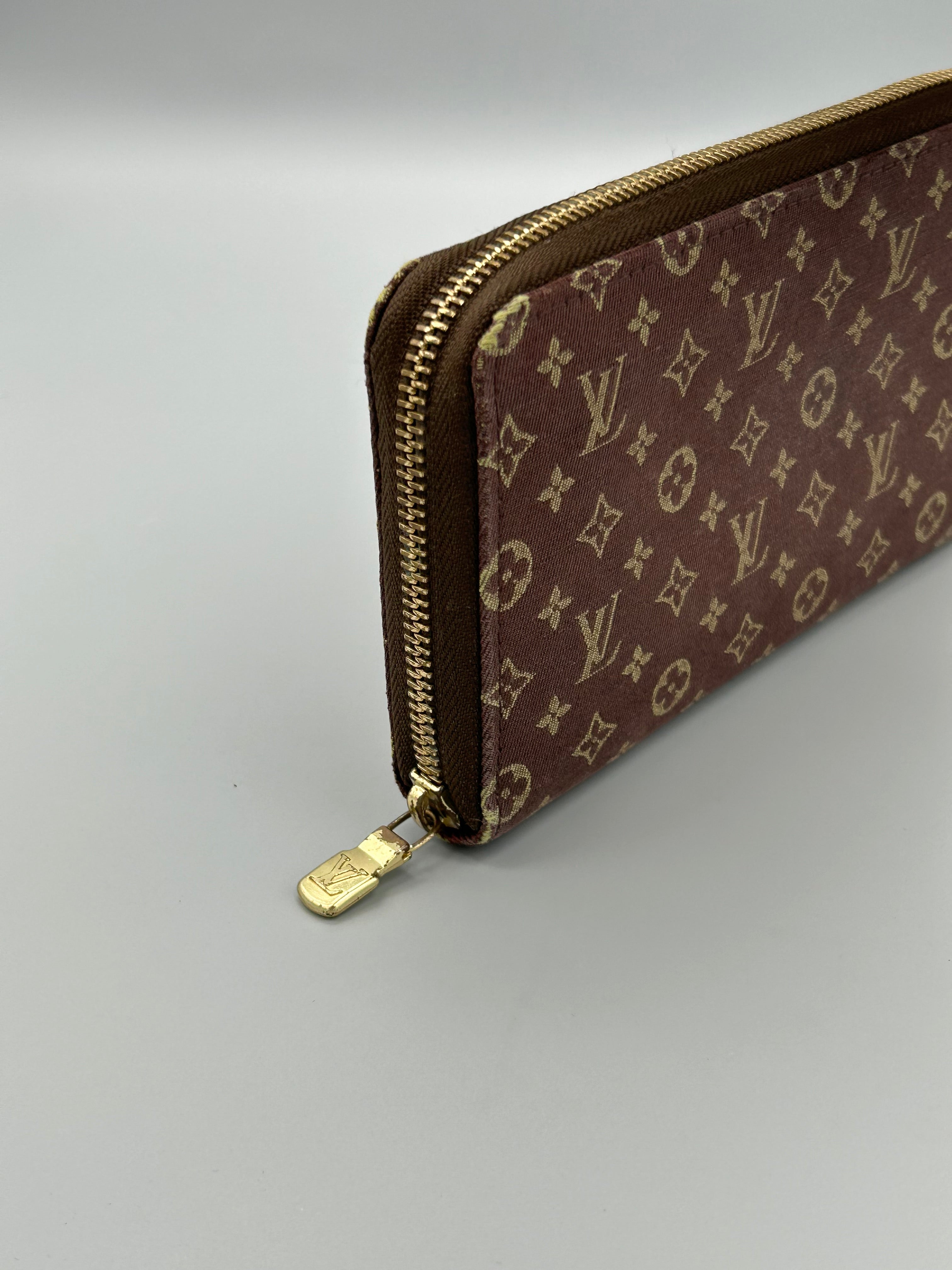 10108 Authentic Pre-loved Louis Vuitton Zippy wallet in Mini Lin Canvas