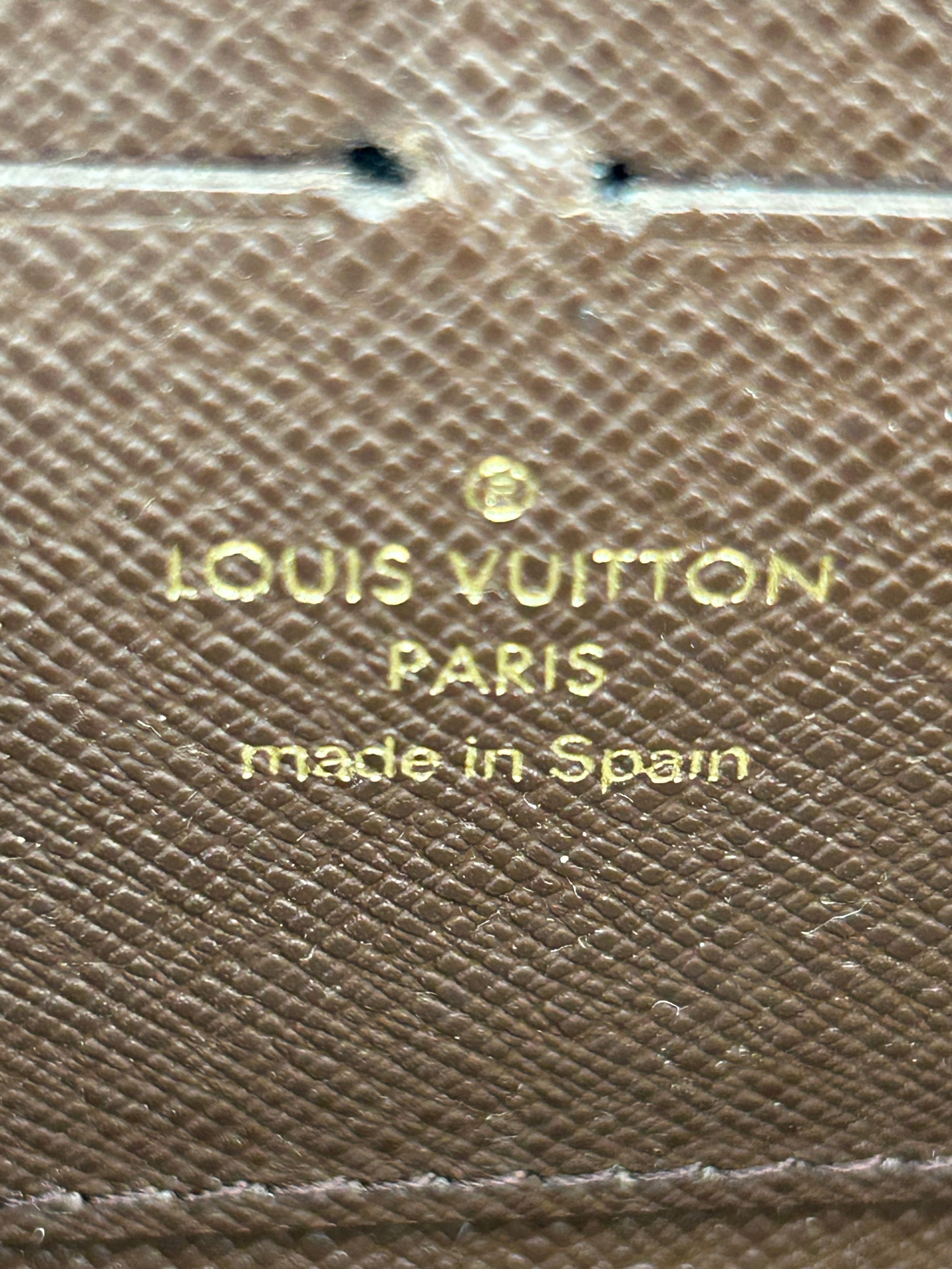 10108 Authentic Pre-loved Louis Vuitton Zippy wallet in Mini Lin Canvas