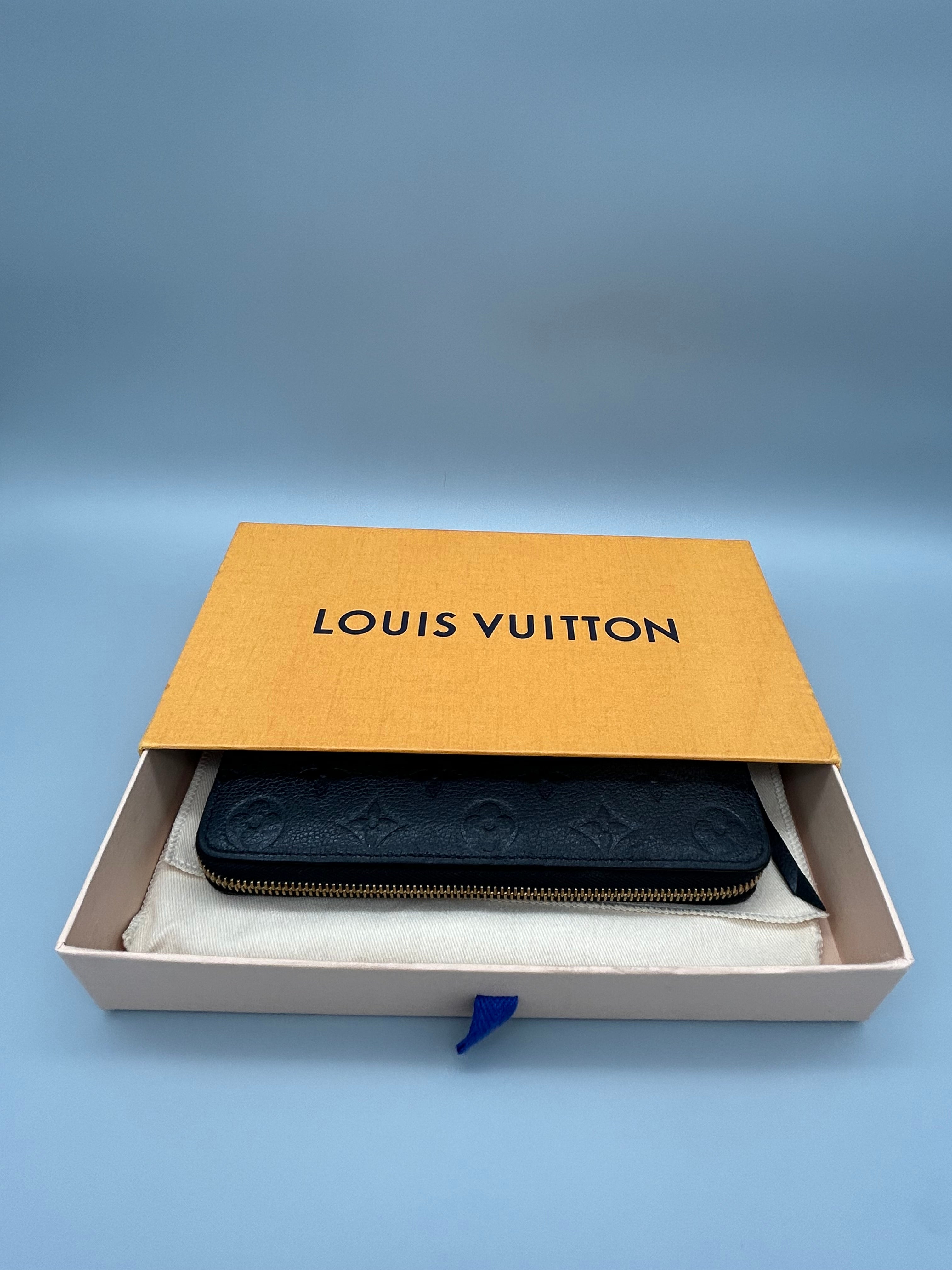 10119 Authentic Pre-Loved Louis Vuitton Zippy Long Wallet in Empriente Black Leather