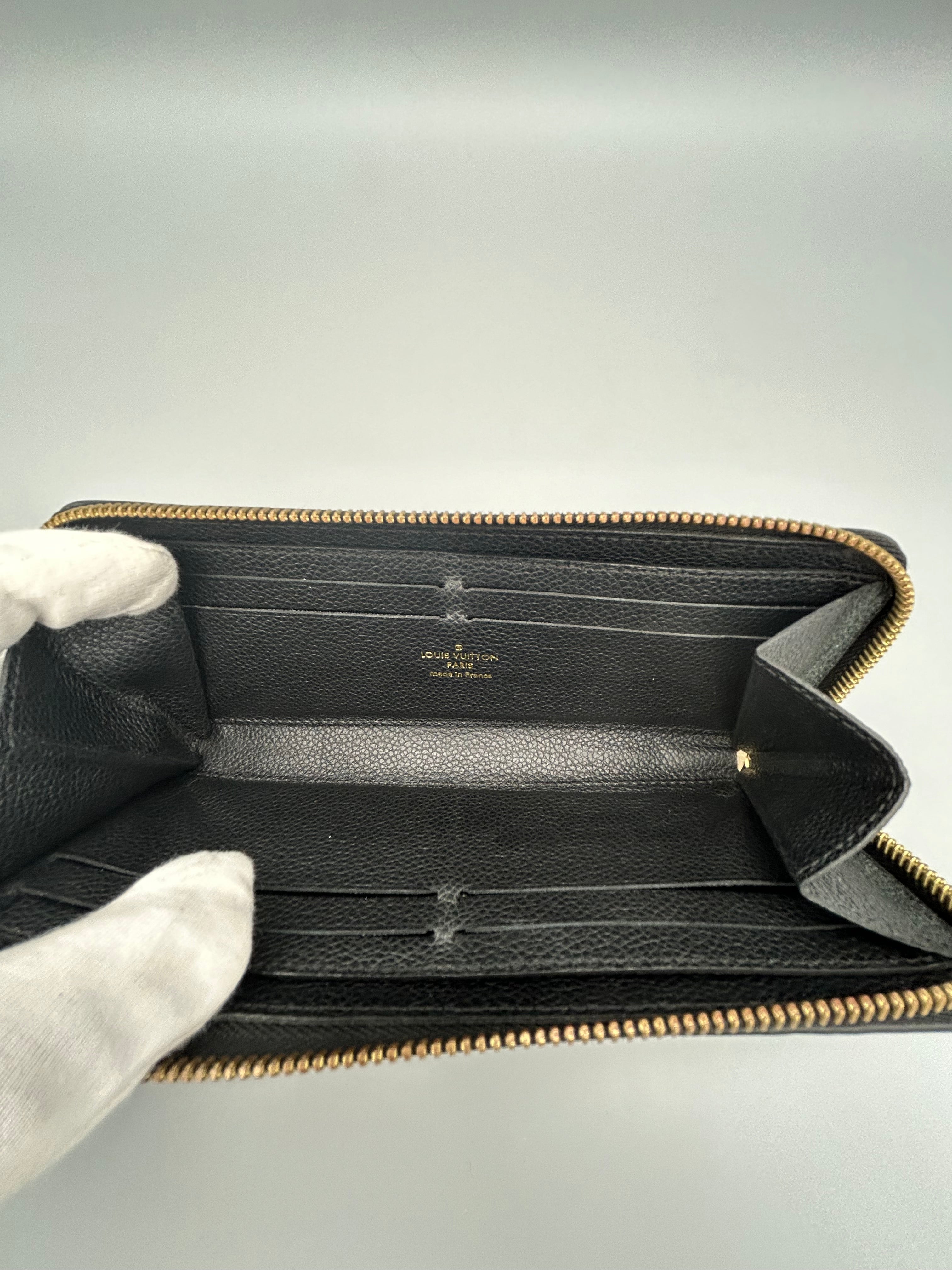 10120 Authentic Pre-Loved Louis Vuitton Zippy Long Wallet in Empriente Black Leather