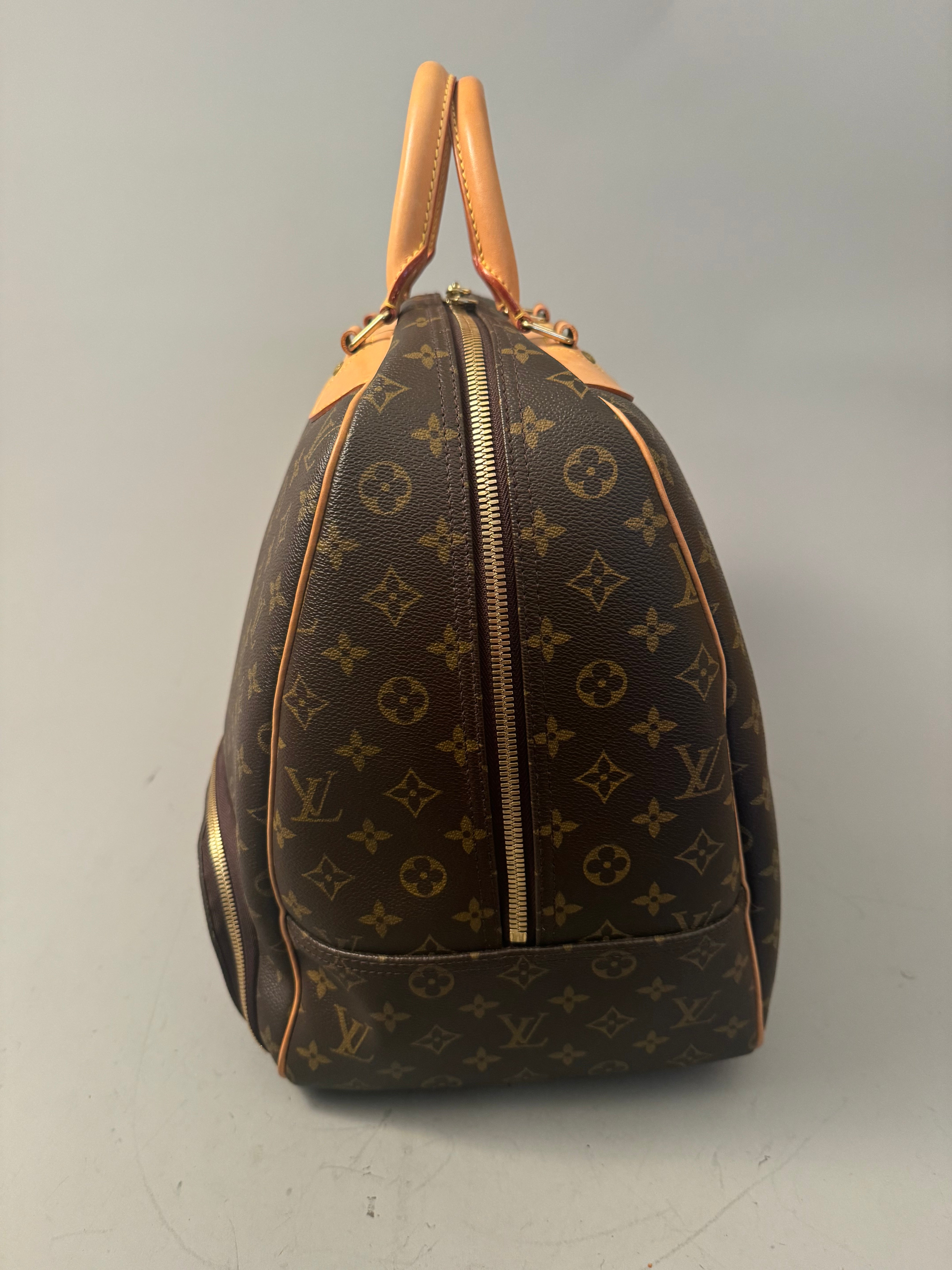 10164 Authentic Pre-loved Louis Vuitton Evasion in Monogram Canvas