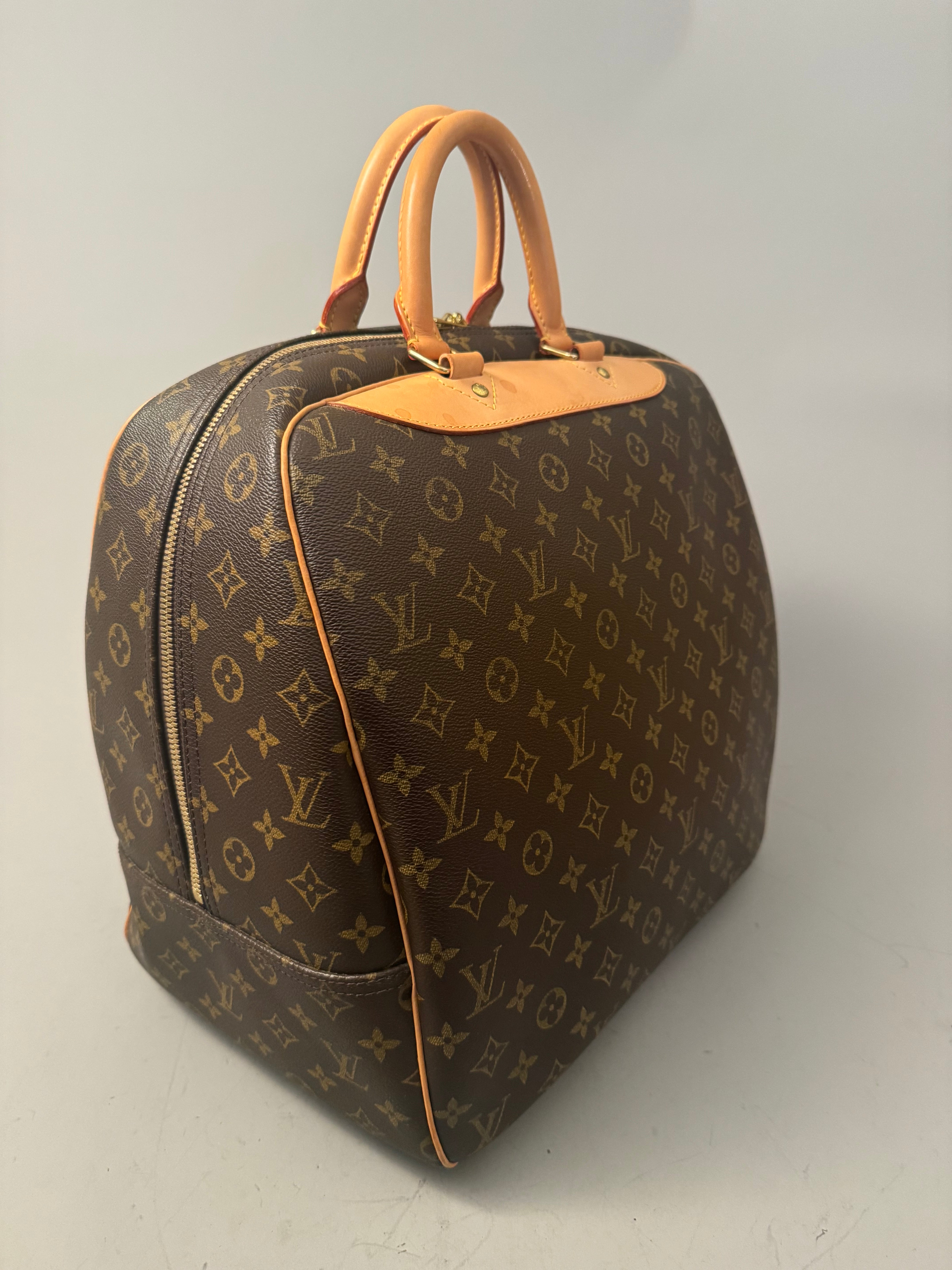 10164 Authentic Pre-loved Louis Vuitton Evasion in Monogram Canvas