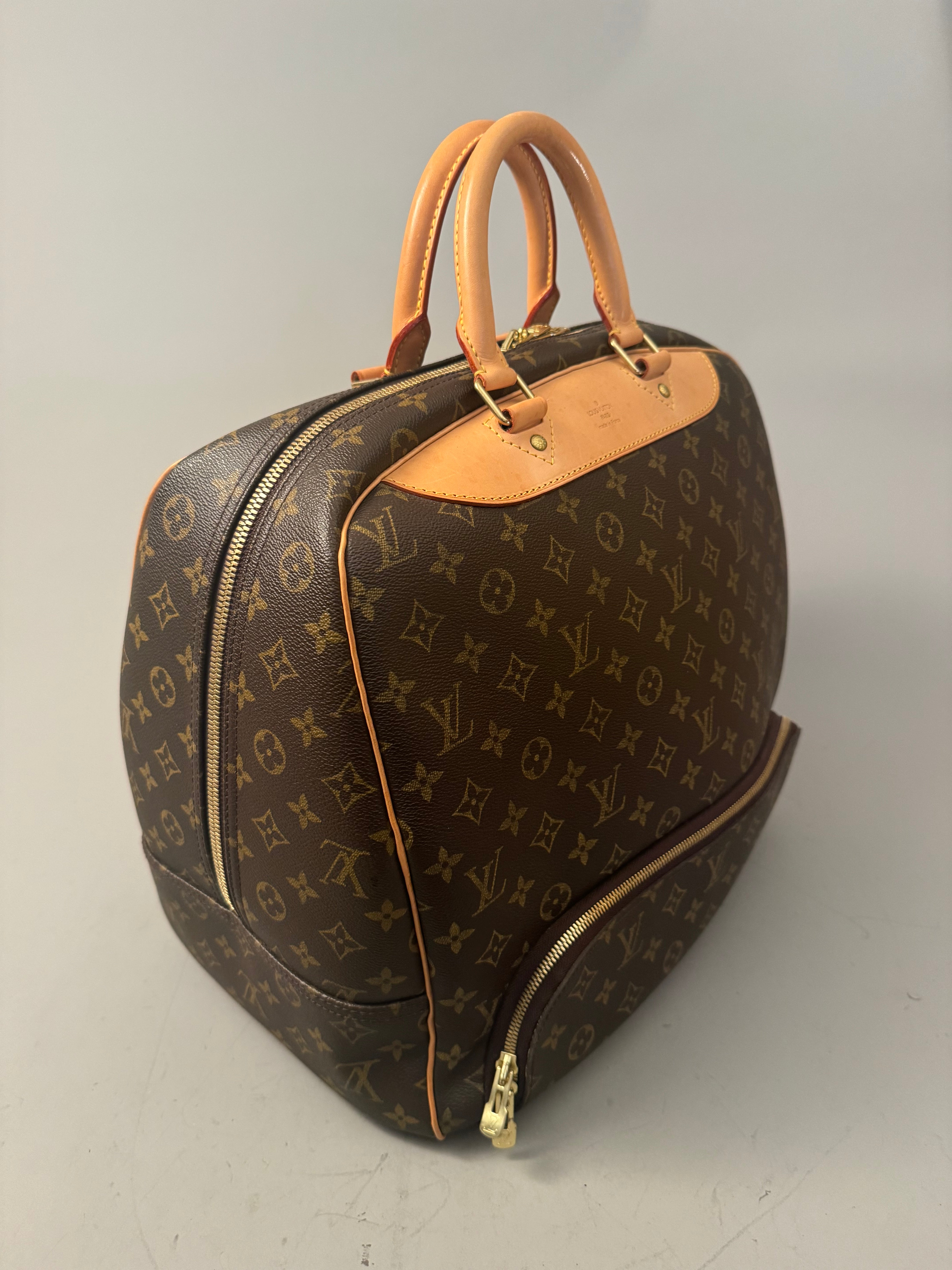 10164 Authentic Pre-loved Louis Vuitton Evasion in Monogram Canvas