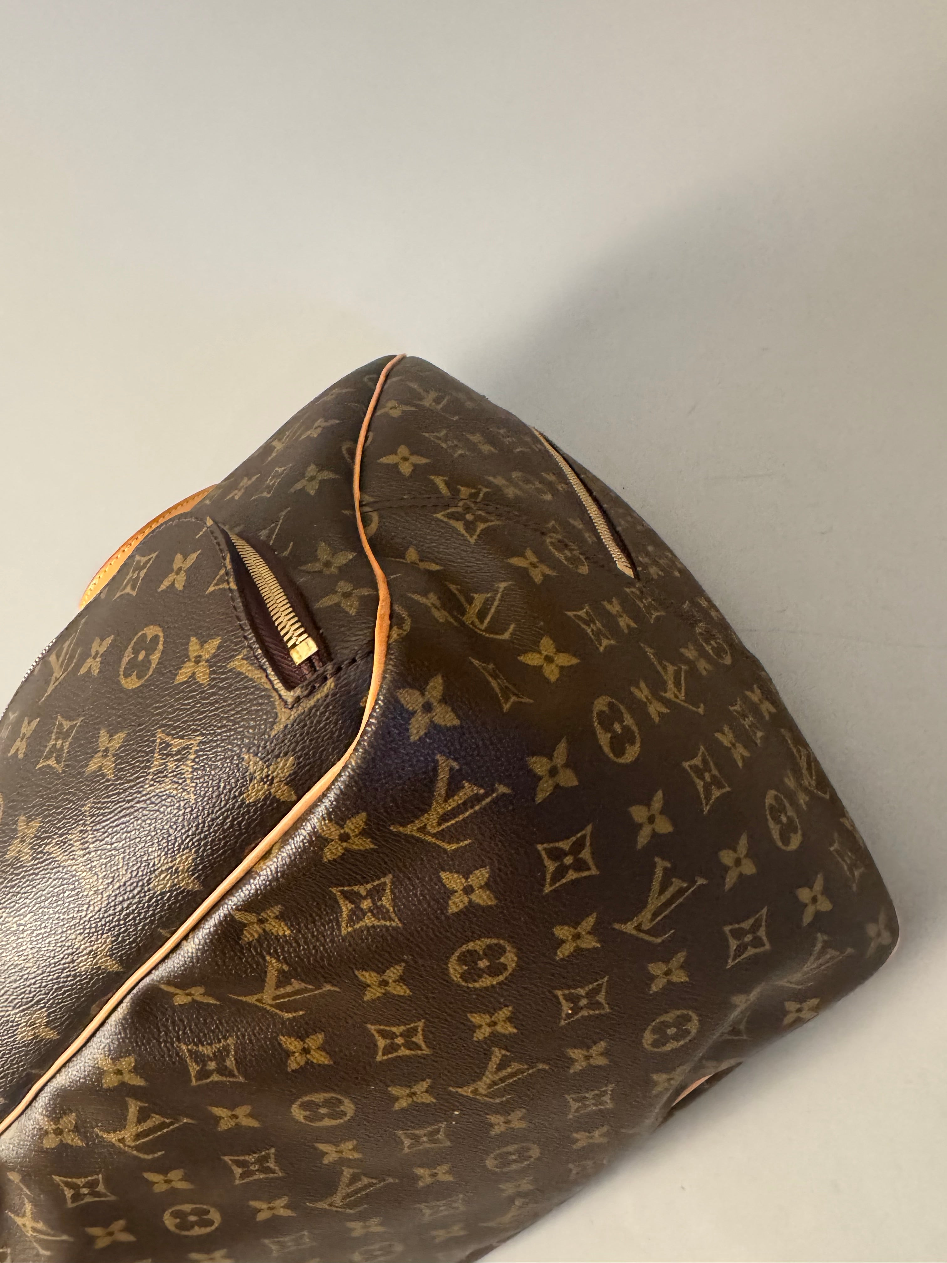 10164 Authentic Pre-loved Louis Vuitton Evasion in Monogram Canvas