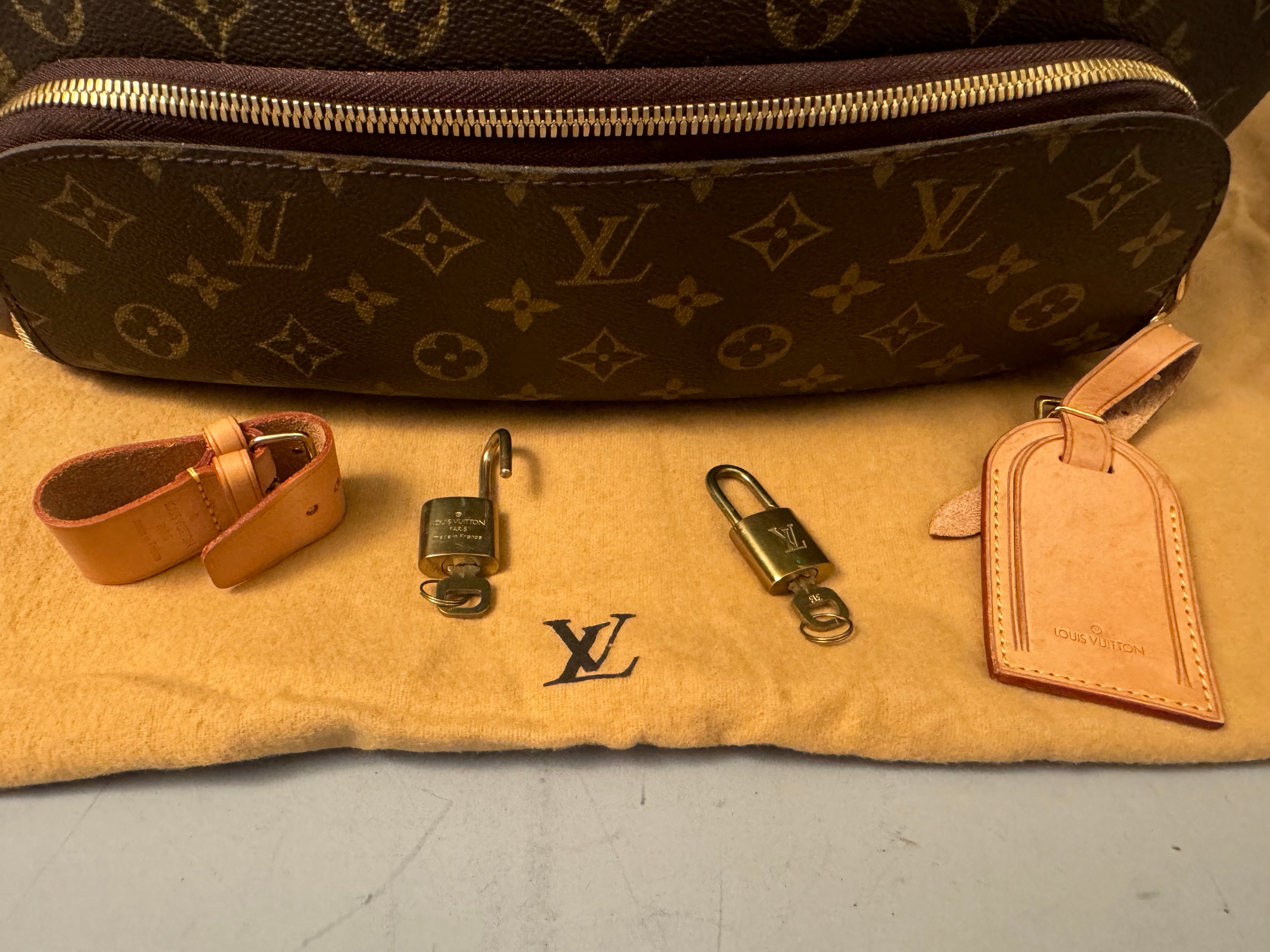 10164 Authentic Pre-loved Louis Vuitton Evasion in Monogram Canvas