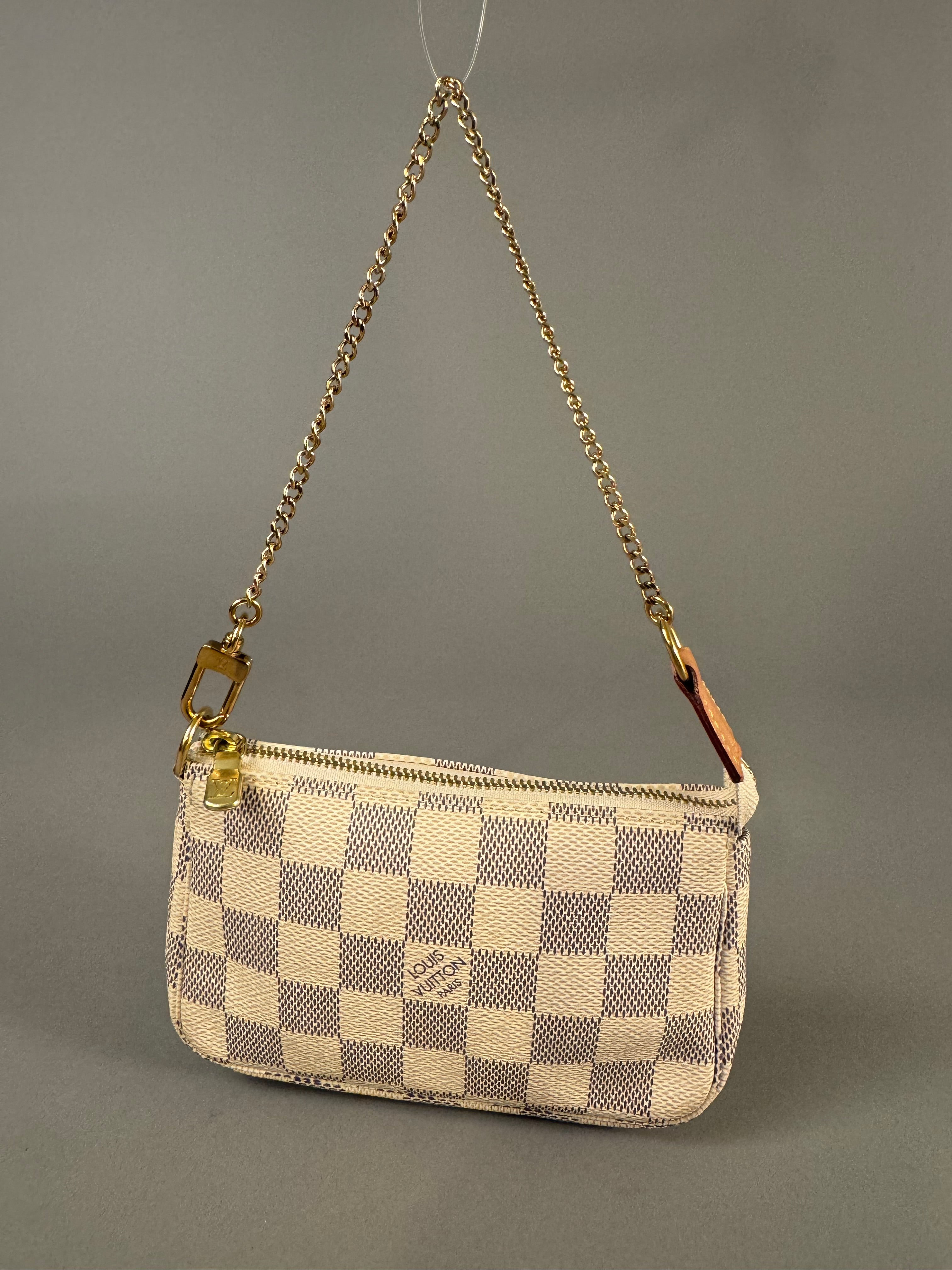 10502 Authentic Pre-loved Louis Vuitton
Mini Pochette in Damier Azur