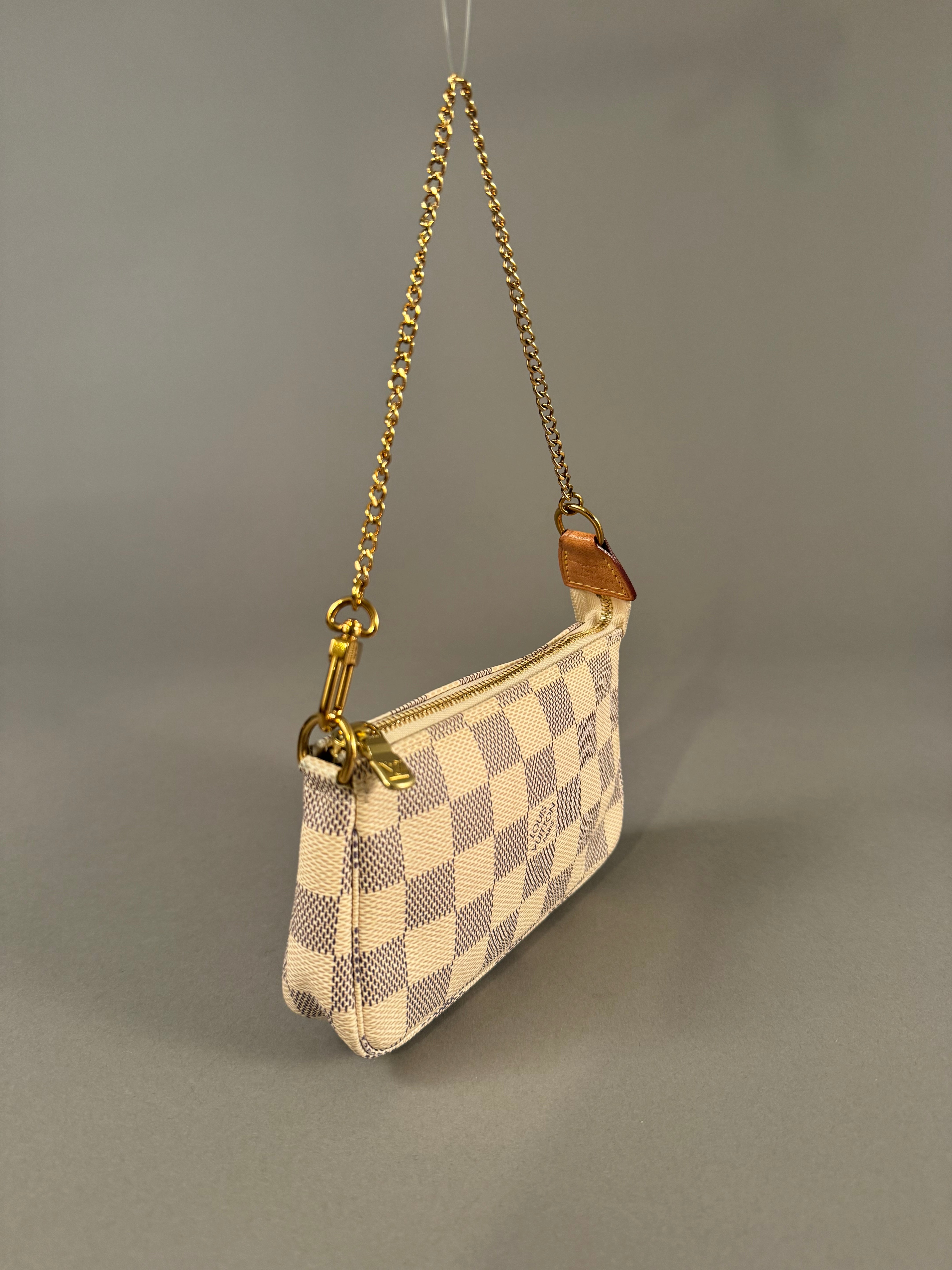 10502 Authentic Pre-loved Louis Vuitton
Mini Pochette in Damier Azur