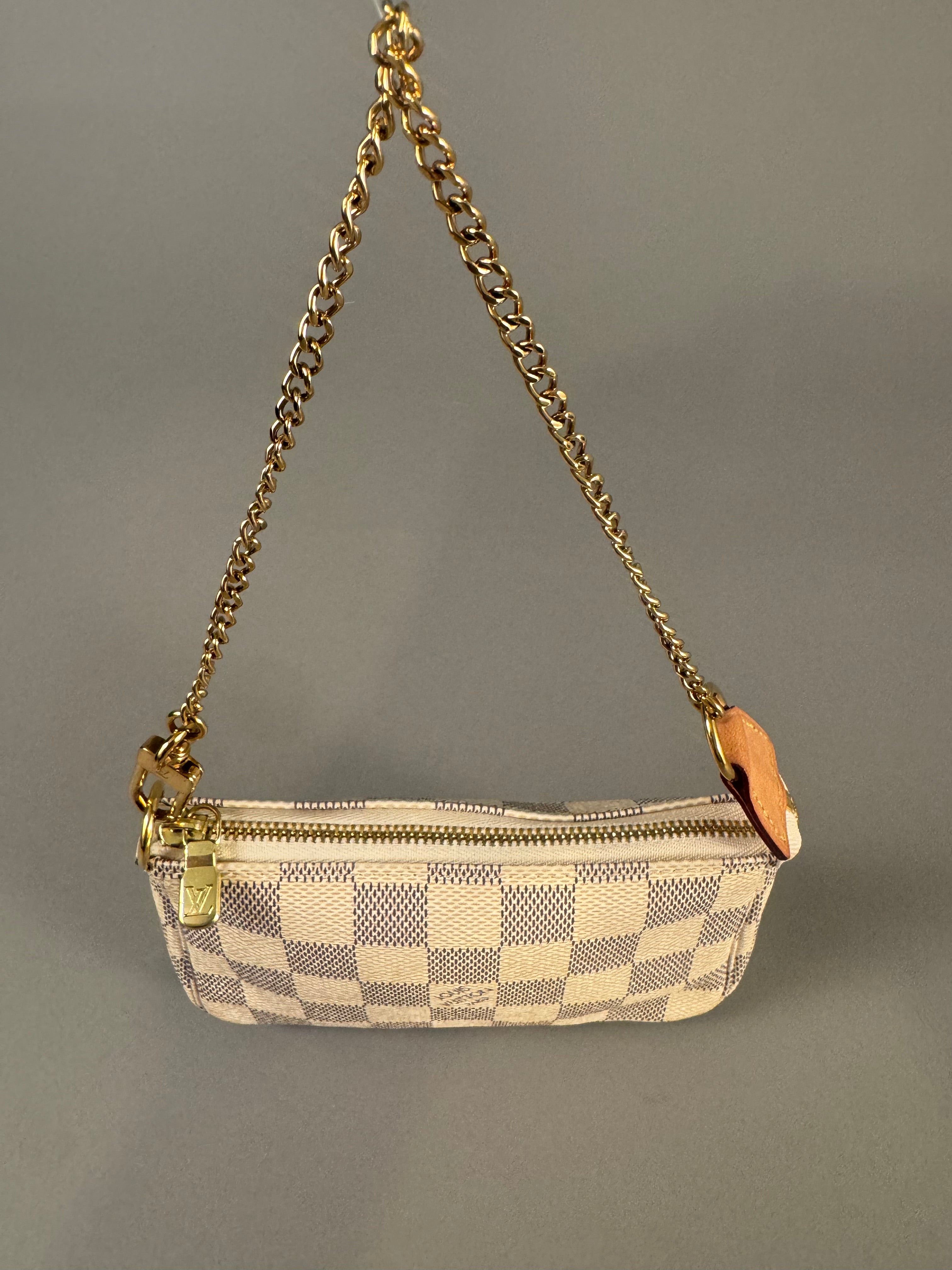 10502 Authentic Pre-loved Louis Vuitton
Mini Pochette in Damier Azur