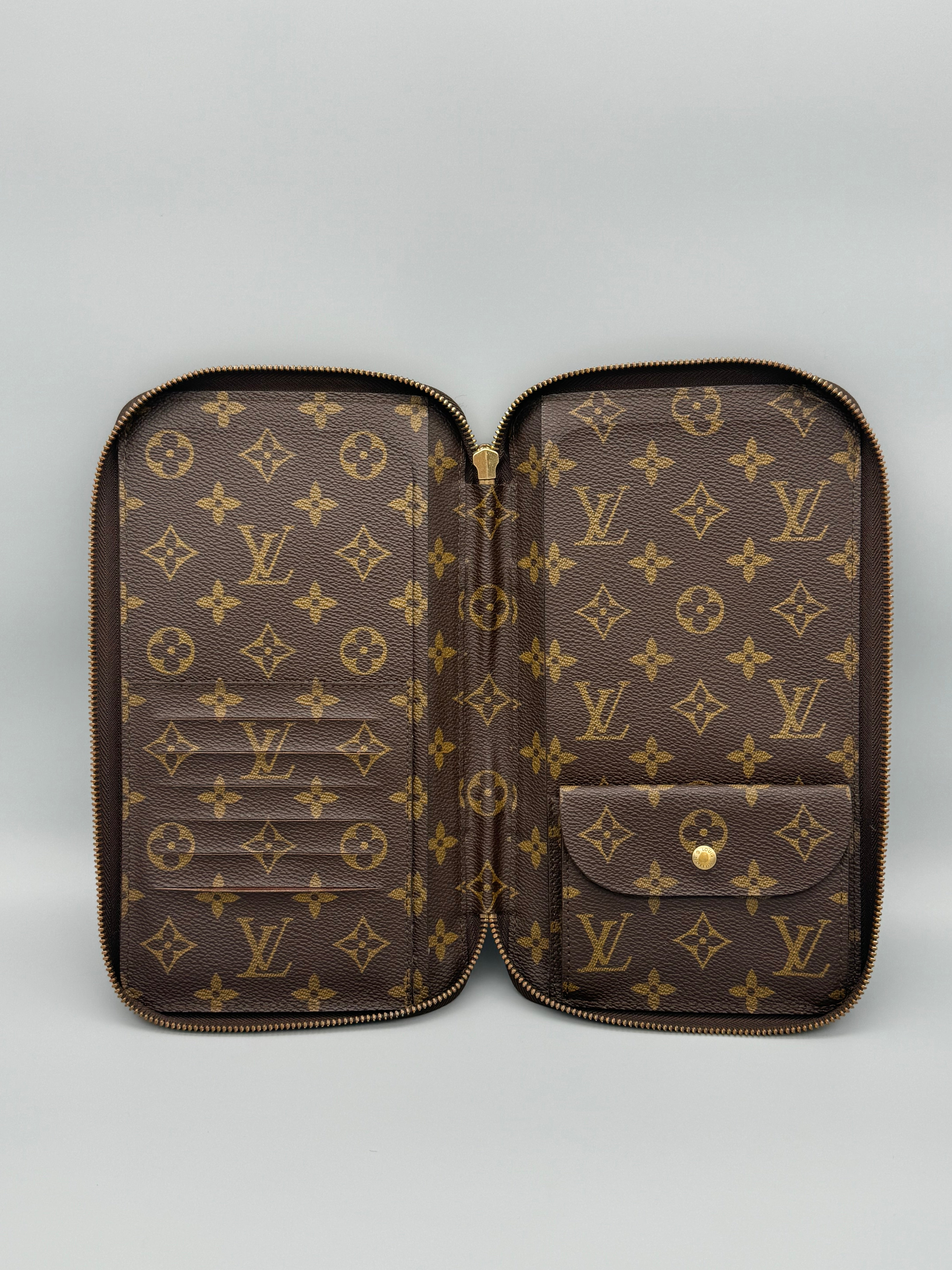 10050 Authentic Pre-loved Louis Vuitton Poche Escapade Bifold Organizer in Monogram Canvas